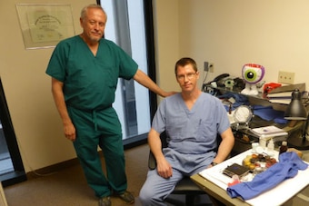 Randy Trawnik and his son, John, at their Dallas lab.