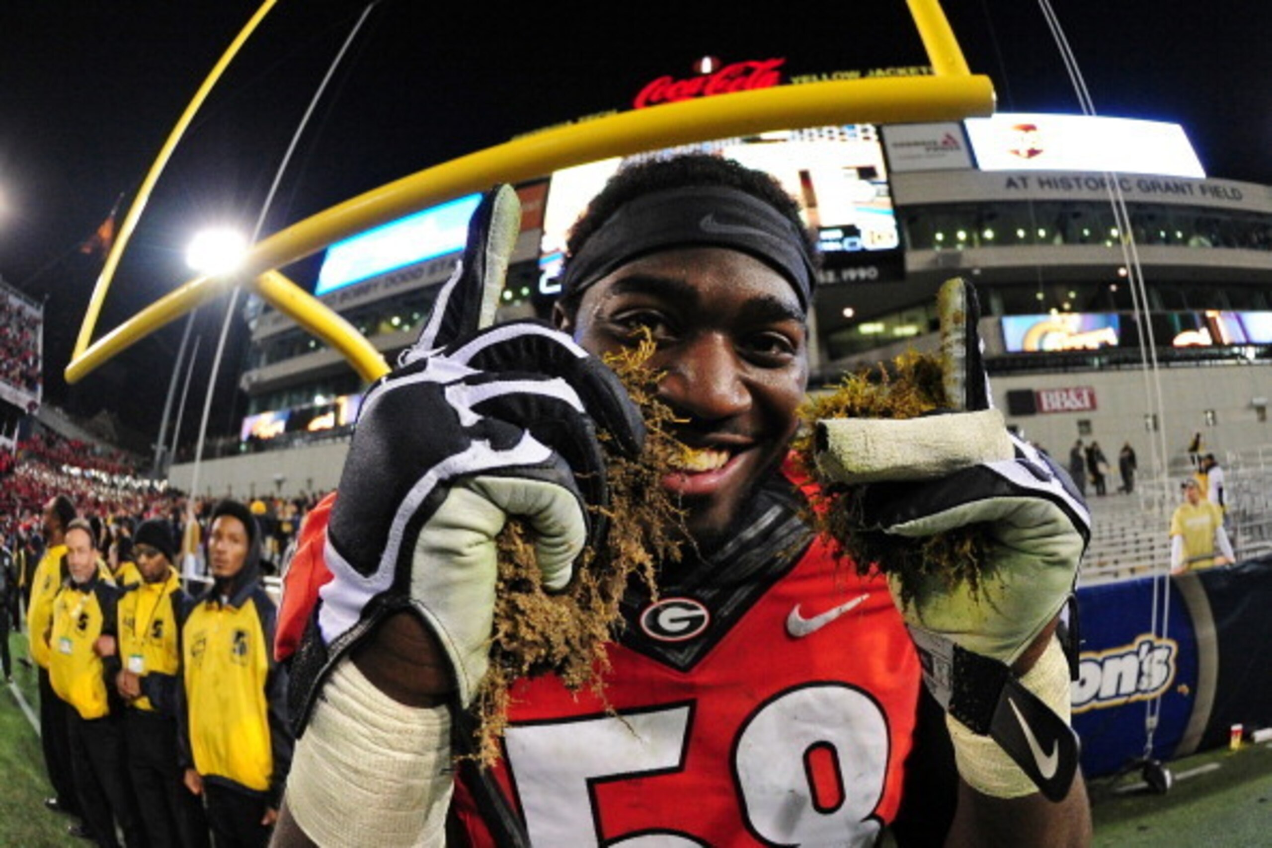 ATLANTA, GA - NOVEMBER 30: Sterling Bailey #58 of the Georgia Bulldogs celebrates after the game against the Georgia Tech Yellow Jackets at Bobby Dodd Stadium on November 30, 2013 in Atlanta, Georgia. (Photo by Scott Cunningham/Getty Images)