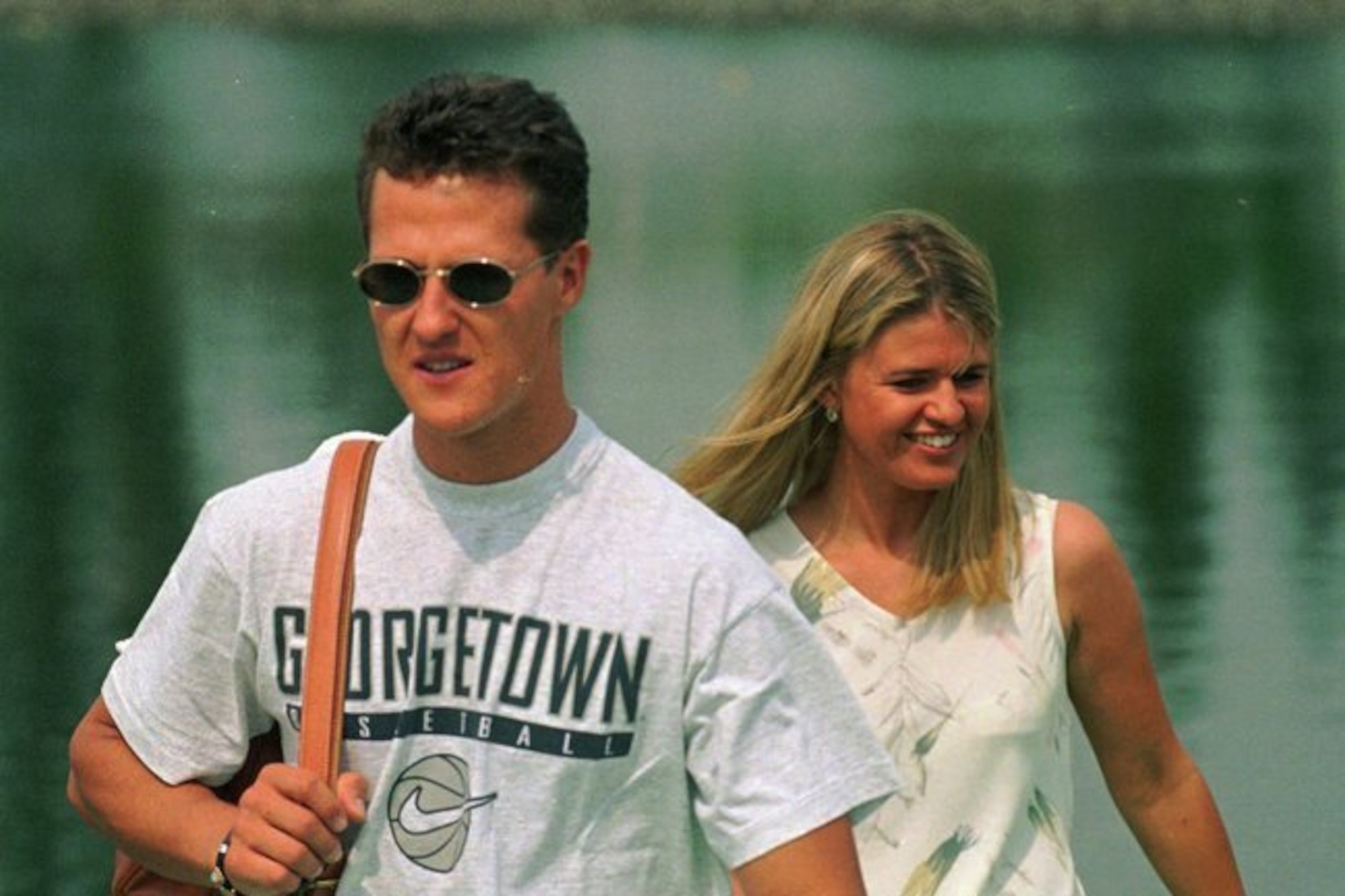 Schumacher with wife Corina. Schumacher with wife Corina.