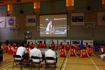 Batum (sitting in the middle) and the BWB campers in Taipei watching the NBA Finals live.