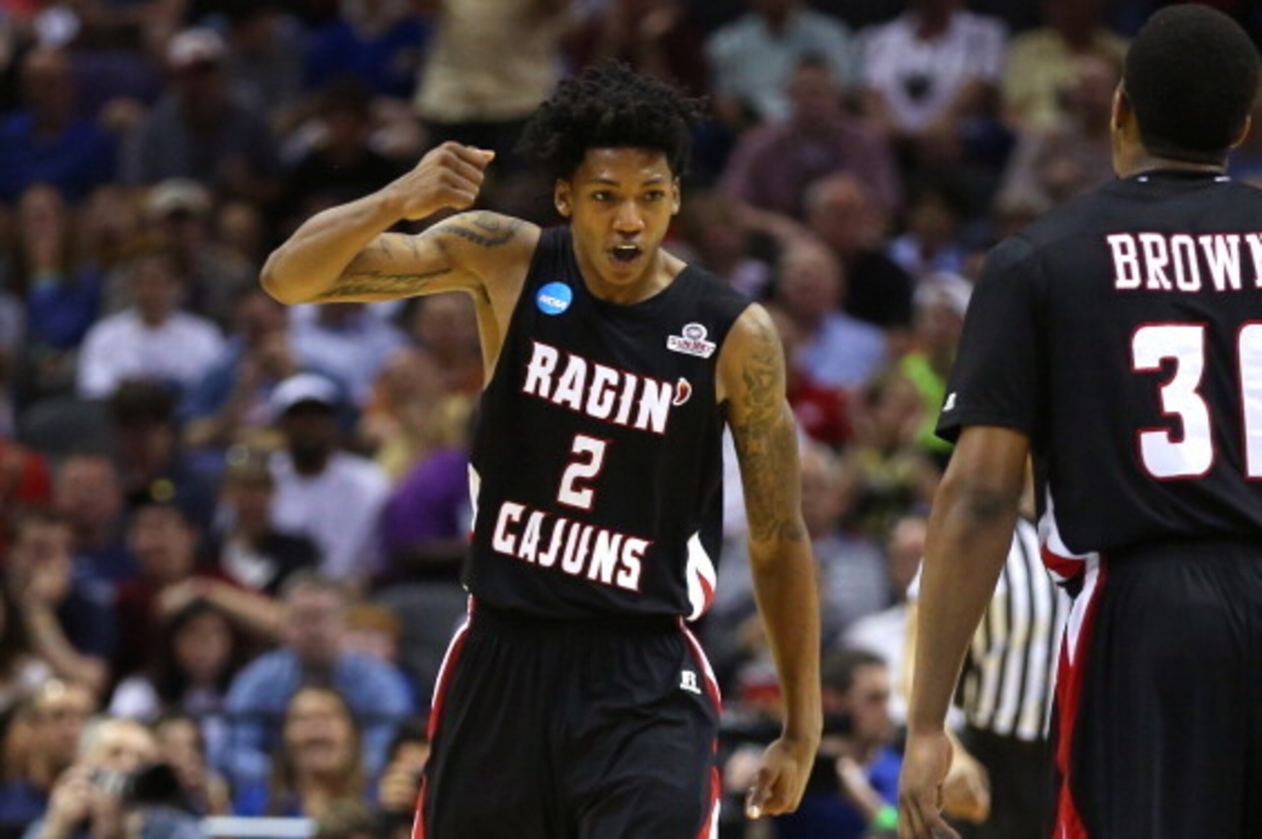 SAN ANTONIO, TX - MARCH 21:  Elfrid Payton #2 of the Louisiana Lafayette Ragin Cajuns celebrates after a play in the second half against the Creighton Bluejays during the second round of the 2014 NCAA Men's Basketball Tournament at AT&T Center on March 21