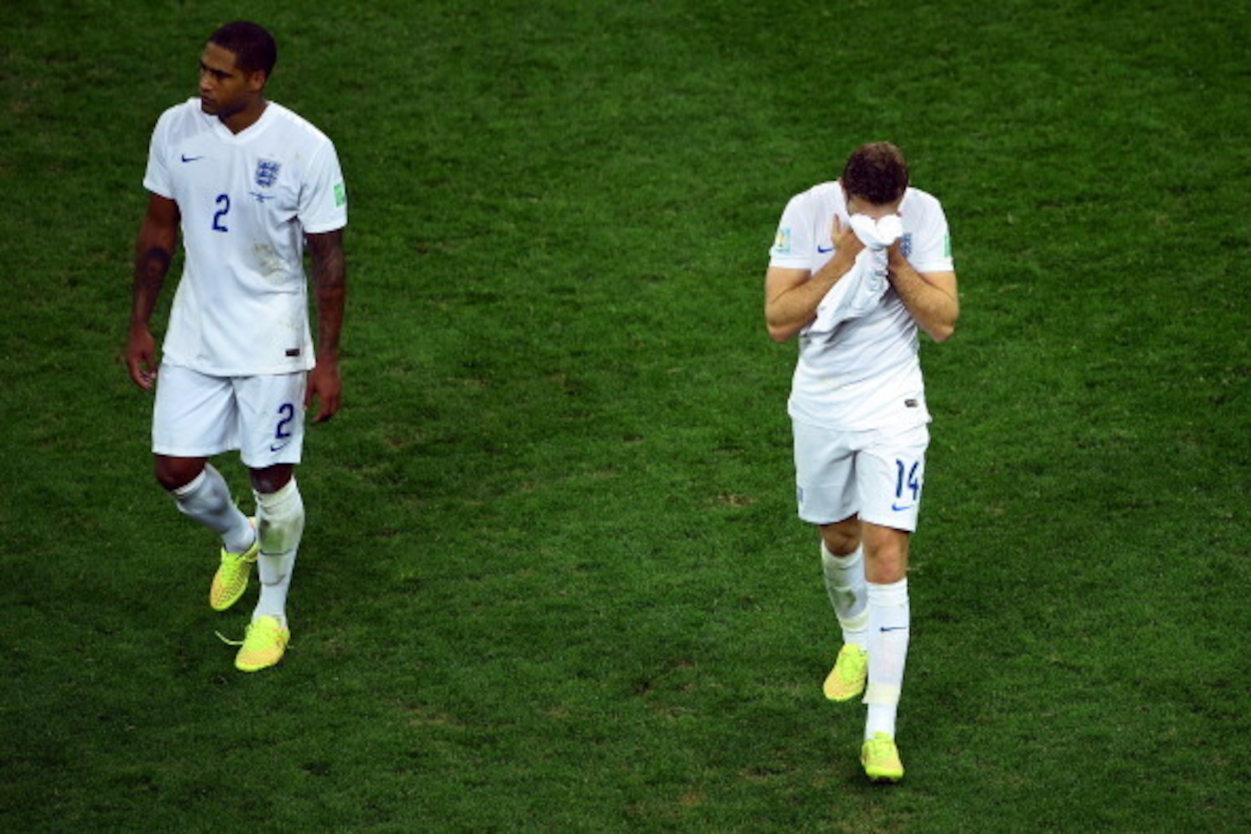 SAO PAULO, BRAZIL - JUNE 19: Glen Johnson and Jordan Henderson of England walk off the pitch after a 2-1 defeat in the 2014 FIFA World Cup Brazil Group D match between Uruguay and England at Arena de Sao Paulo on June 19, 2014 in Sao Paulo, Brazil. (Pho SAO PAULO, BRAZIL - JUNE 19: Glen Johnson and Jordan Henderson of England walk off the pitch after a 2-1 defeat in the 2014 FIFA World Cup Brazil Group D match between Uruguay and England at Arena de Sao Paulo on June 19, 2014 in Sao Paulo, Brazil. (Pho