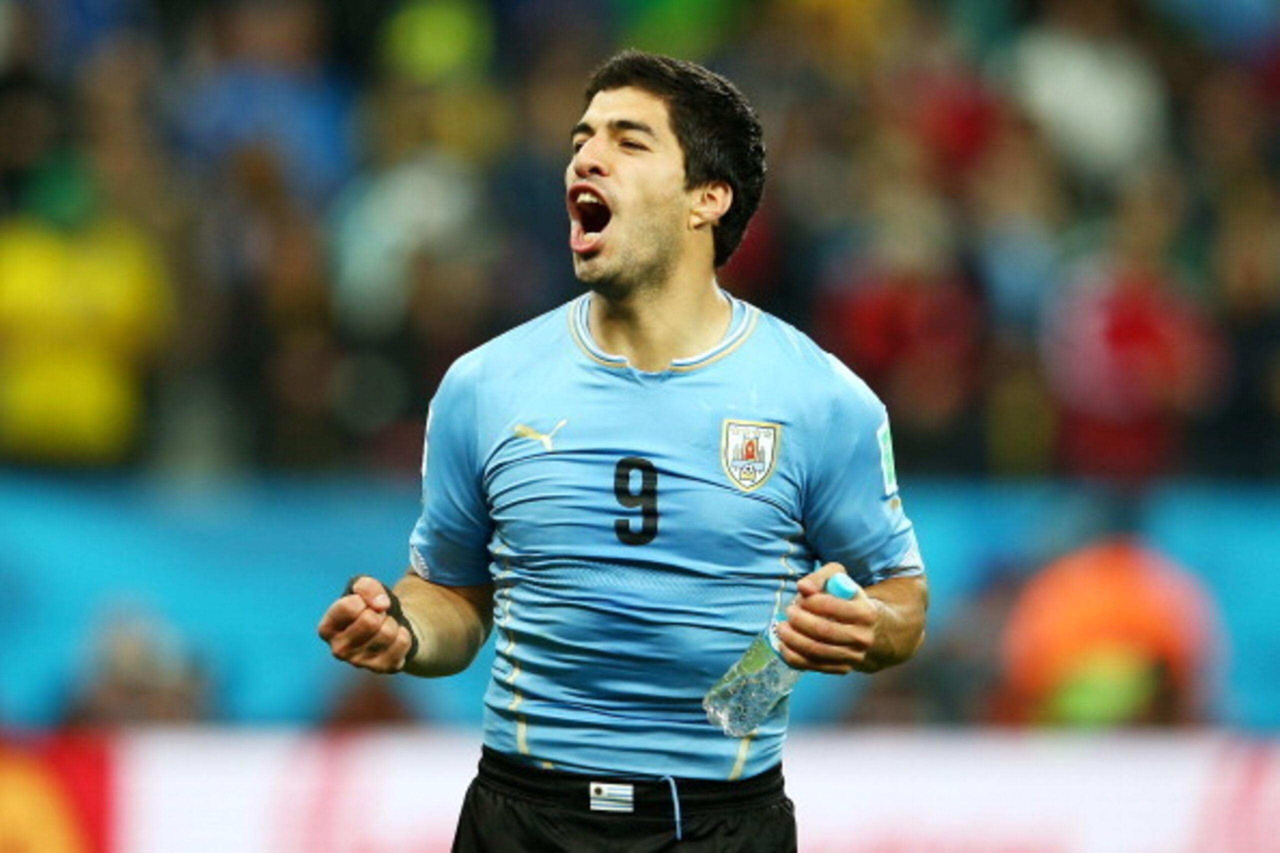 SAO PAULO, BRAZIL - JUNE 19:  Luis Suarez of Uruguay celebrates after defeating England 2-1 during the 2014 FIFA World Cup Brazil Group D match between Uruguay and England at Arena de Sao Paulo on June 19, 2014 in Sao Paulo, Brazil.  (Photo by Julian Finn