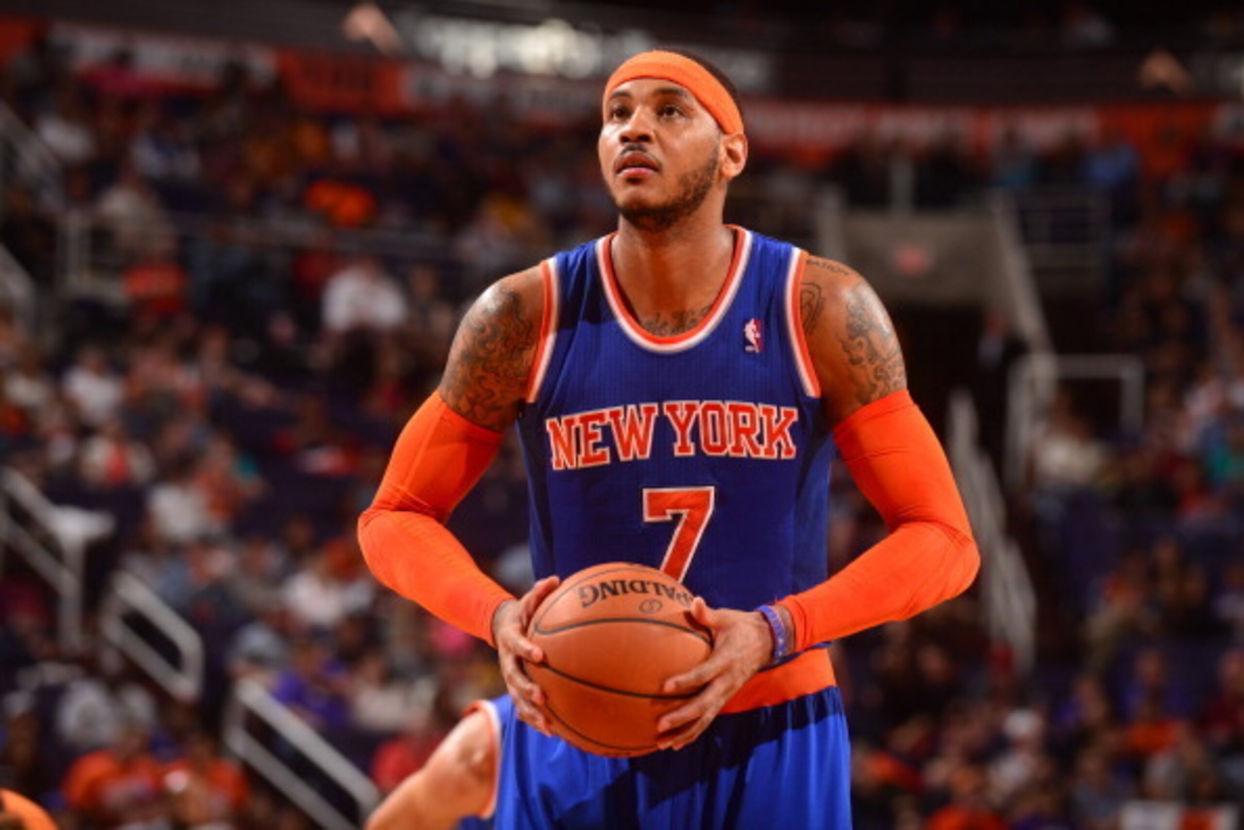 PHOENIX, AZ - MARCH 28: Carmelo Anthony #7 of the New York Knicks shoots a free throw during the game against the Phoenix Suns on March 28, 2014 at U.S. Airways Center in Phoenix, Arizona. NOTE TO USER: User expressly acknowledges and agrees that, by down