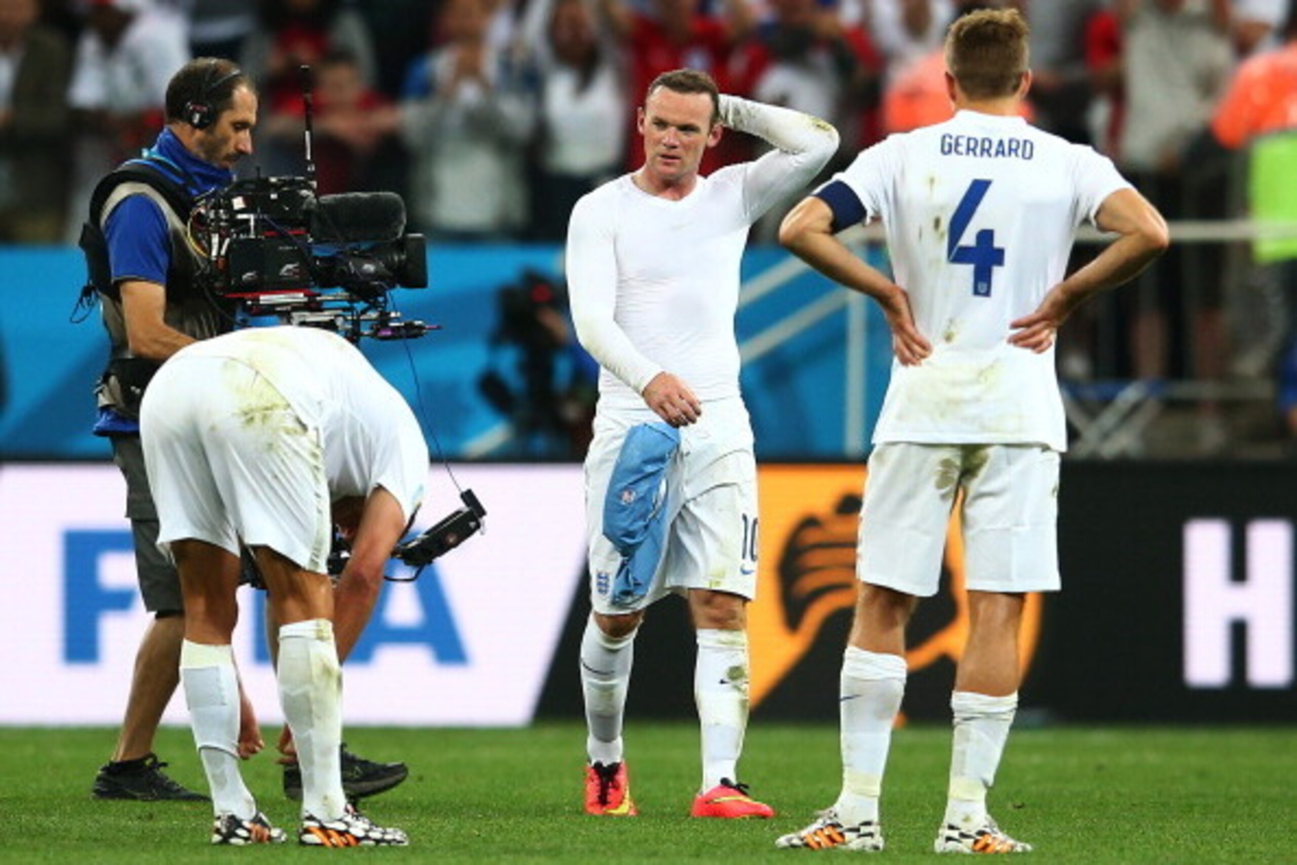 SAO PAULO, BRAZIL - JUNE 19:  Wayne Rooney of England looks dejected after a 2-1 defeat in the 2014 FIFA World Cup Brazil Group D match between Uruguay and England at Arena de Sao Paulo on June 19, 2014 in Sao Paulo, Brazil.  (Photo by Julian Finney/Getty