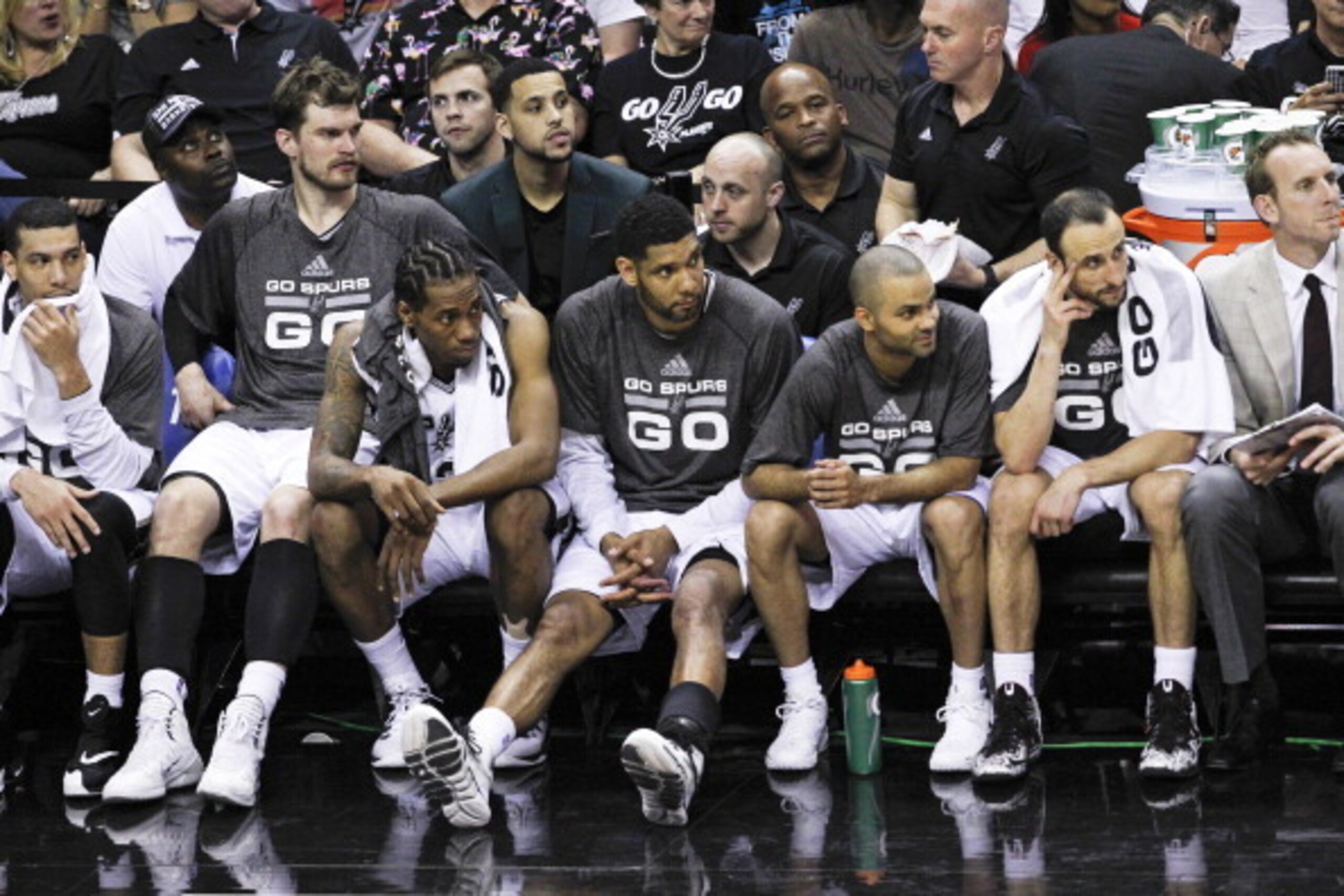 SAN ANTONIO, TX - MAY 21: Danny Green #4, Tiago Splitter #22, Kawhi Leonard #2, Tim Duncan #21, Tony Parker #9 and Manu Ginobili #20 of the San Antonio Spurs watch from the bench as their team defeats the Oklahoma City Thunder in Game Two of the Western C SAN ANTONIO, TX - MAY 21: Danny Green #4, Tiago Splitter #22, Kawhi Leonard #2, Tim Duncan #21, Tony Parker #9 and Manu Ginobili #20 of the San Antonio Spurs watch from the bench as their team defeats the Oklahoma City Thunder in Game Two of the Western C
