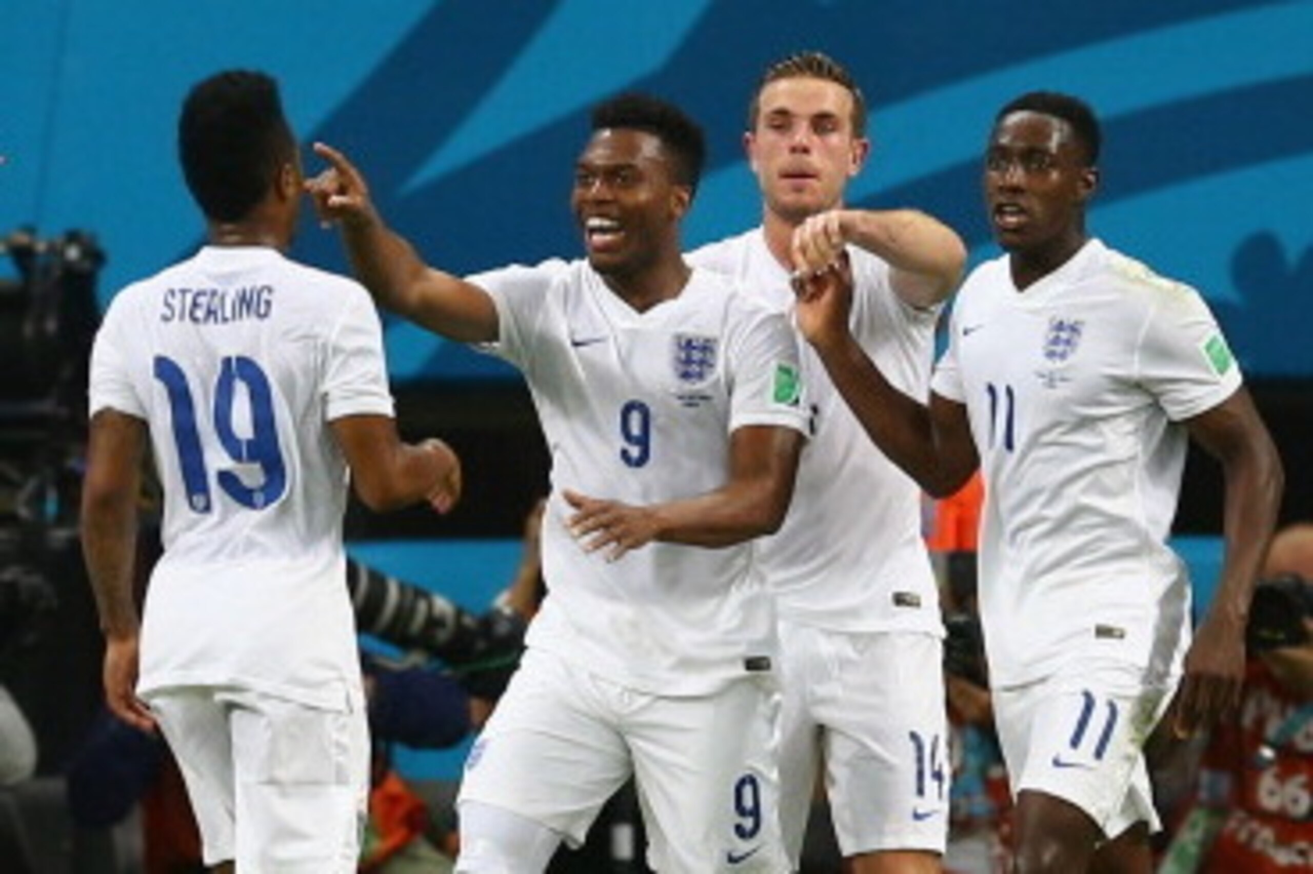MANAUS, BRAZIL - JUNE 14: Daniel Sturridge of England (C) celebrates scoring his team's first goal with Wayne Rooney (L), Raheem Sterling (2nd L), Jordan Henderson (2nd R) and Danny Welbeck (R) during the 2014 FIFA World Cup Brazil Group D match between E