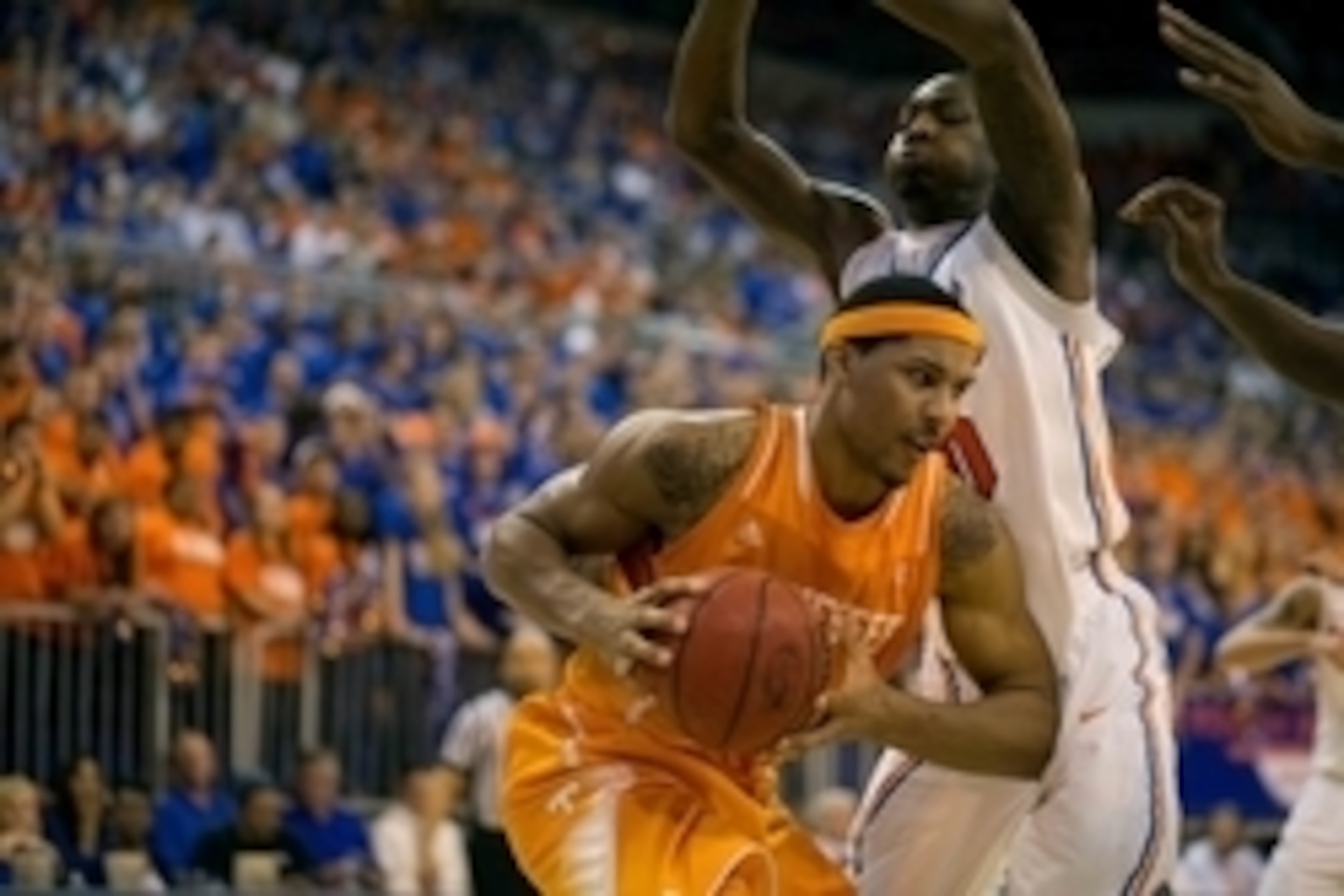 Jan 25, 2014; Gainesville, FL, USA; Florida Gators forward Dorian Finney-Smith (10) defends Tennessee Volunteers forward Jarnell Stokes (5) during the 2nd half of the game at the Stephen C. O'Connell Center. Mandatory Credit: Rob Foldy-USA TODAY Sports