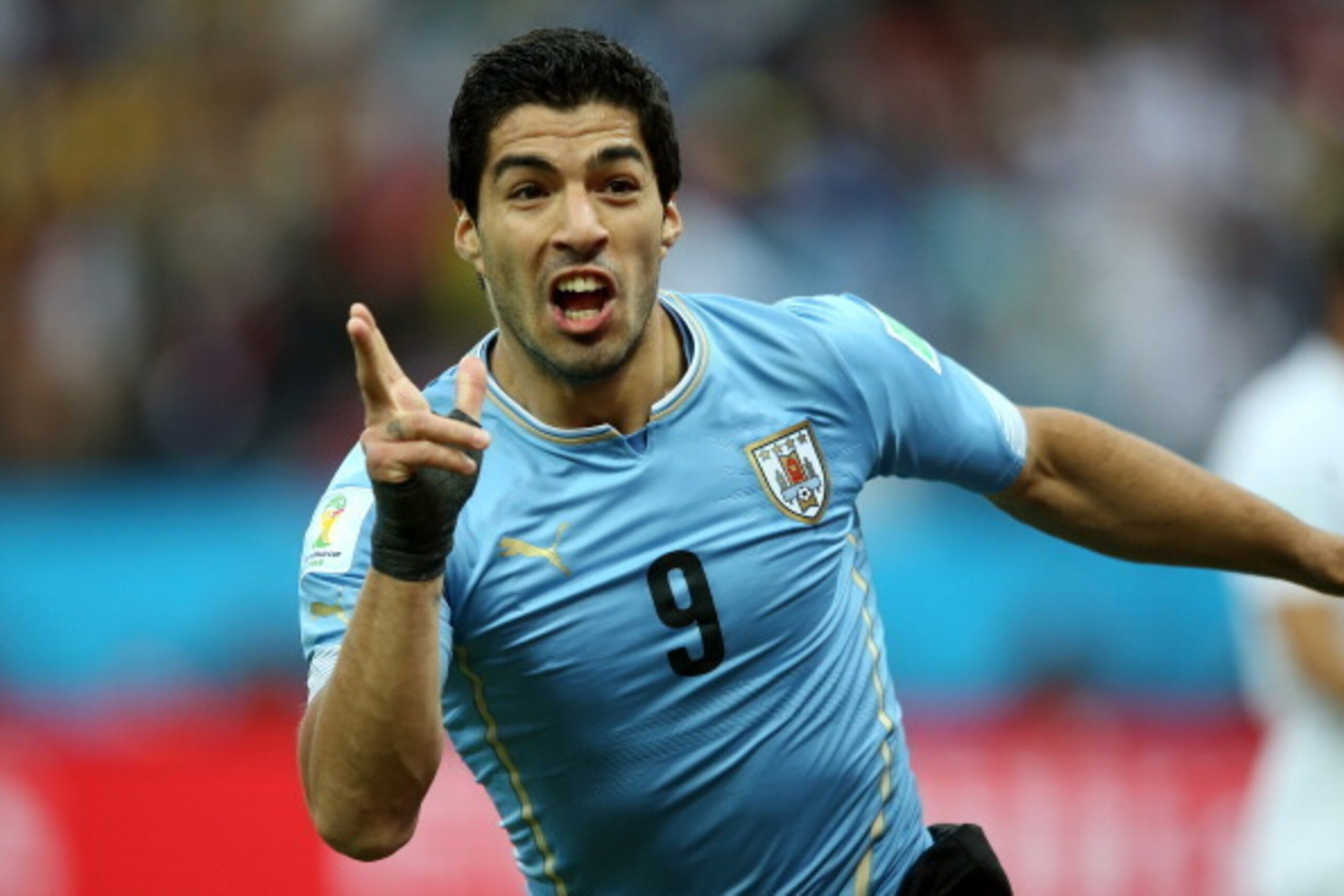 SAO PAULO, BRAZIL - JUNE 19:  Luis Suarez of Uruguay celebrates scoring his team's first goal during the 2014 FIFA World Cup Brazil Group D match between Uruguay and England at Arena de Sao Paulo on June 19, 2014 in Sao Paulo, Brazil.  (Photo by Richard H