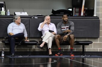 SAN ANTONIO, TX JUNE 6: Miami Heat owner Micky Arison, President Pat Riley and LeBron James speak as part of the 2014 NBA Finals on June 6, 2014 at the Spurs Practice Facility in San Antonio, Texas. NOTE TO USER: User expressly acknowledges and agrees tha