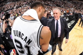 SAN ANTONIO, TX - JUNE 15: Tim Duncan #21 of the San Antonio Spurs and Pat Riley of the Miami Heat shake hands after the San Antonio Spurs victory in Game Five to win the 2014 NBA Finals between the Miami Heat and San Antonio Spurs at AT&T Center on June 
