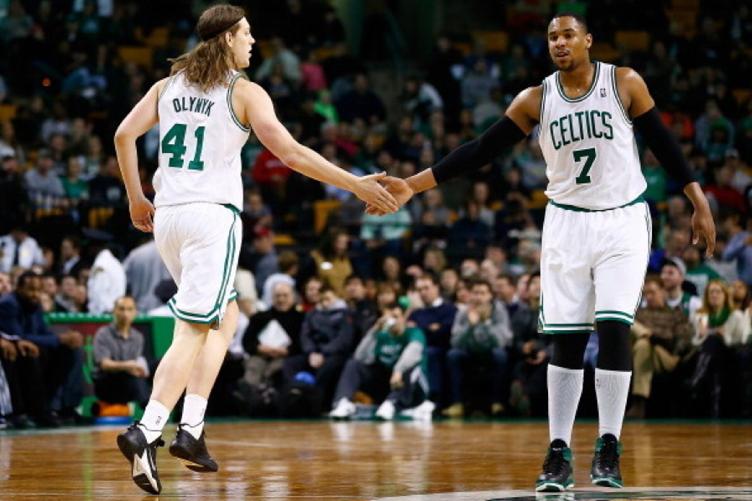 BOSTON, MA - DECEMBER 16: Kelly Olynyk #41 and Jared Sullinger #7 of the Boston Celtics react following a basket in the second quarter against the Minnesota Timberwolves during the game at TD Garden on December 16, 2013 in Boston, Massachusetts. NOTE TO U