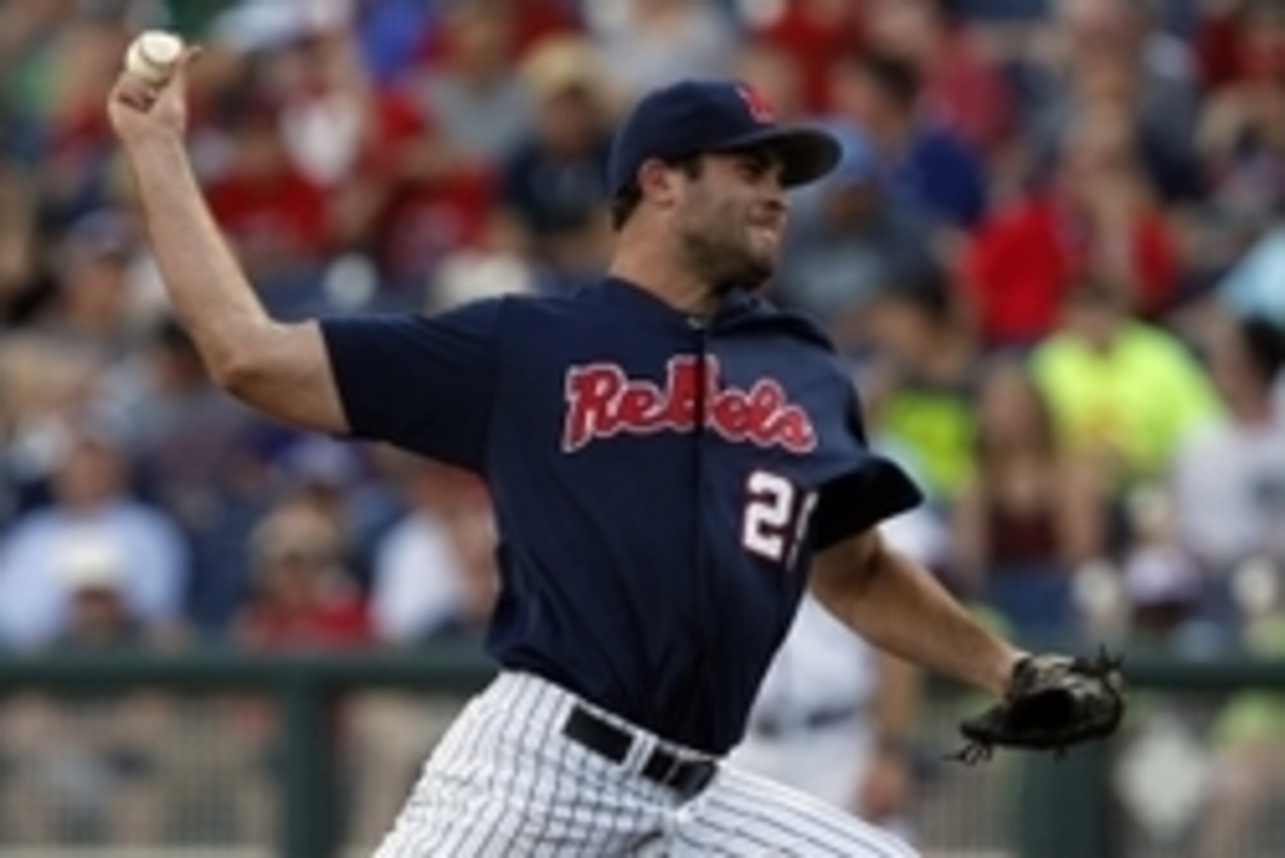 Jun 19, 2014; Omaha, NE, USA; Mississippi Rebels pitcher Sam Smith (29) throws against the TCU Horned Frogs during game ten of the 2014 College World Series at TD Ameritrade Park Omaha. Mandatory Credit: Bruce Thorson-USA TODAY Sports Jun 19, 2014; Omaha, NE, USA; Mississippi Rebels pitcher Sam Smith (29) throws against the TCU Horned Frogs during game ten of the 2014 College World Series at TD Ameritrade Park Omaha. Mandatory Credit: Bruce Thorson-USA TODAY Sports