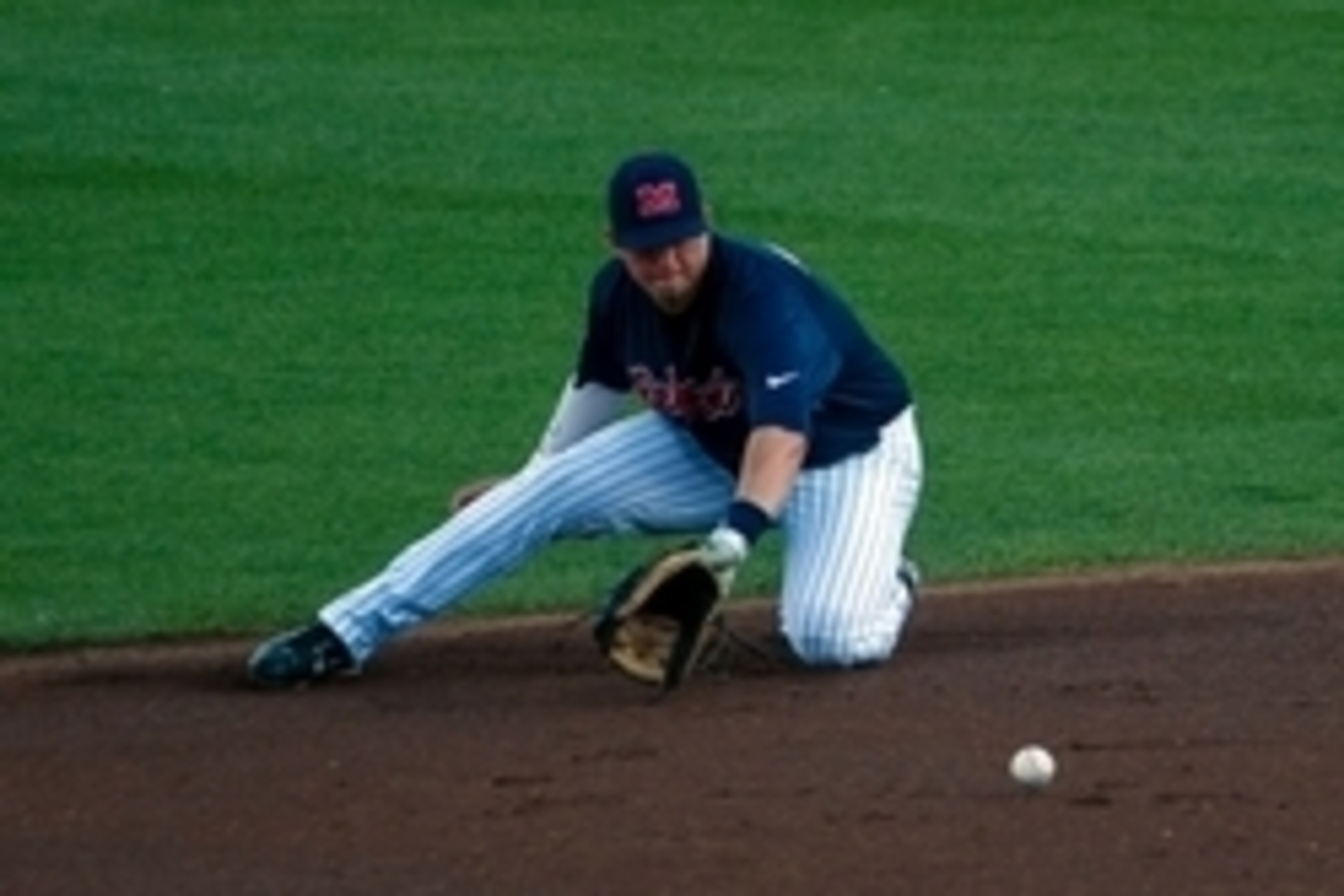 Jun 19, 2014; Omaha, NE, USA; Mississippi Rebels infielder Preston Overbey (1) fields a ground ball against the TCU Horned Frogs during game ten of the 2014 College World Series at TD Ameritrade Park Omaha. Mandatory Credit: Steven Branscombe-USA TODAY Sp