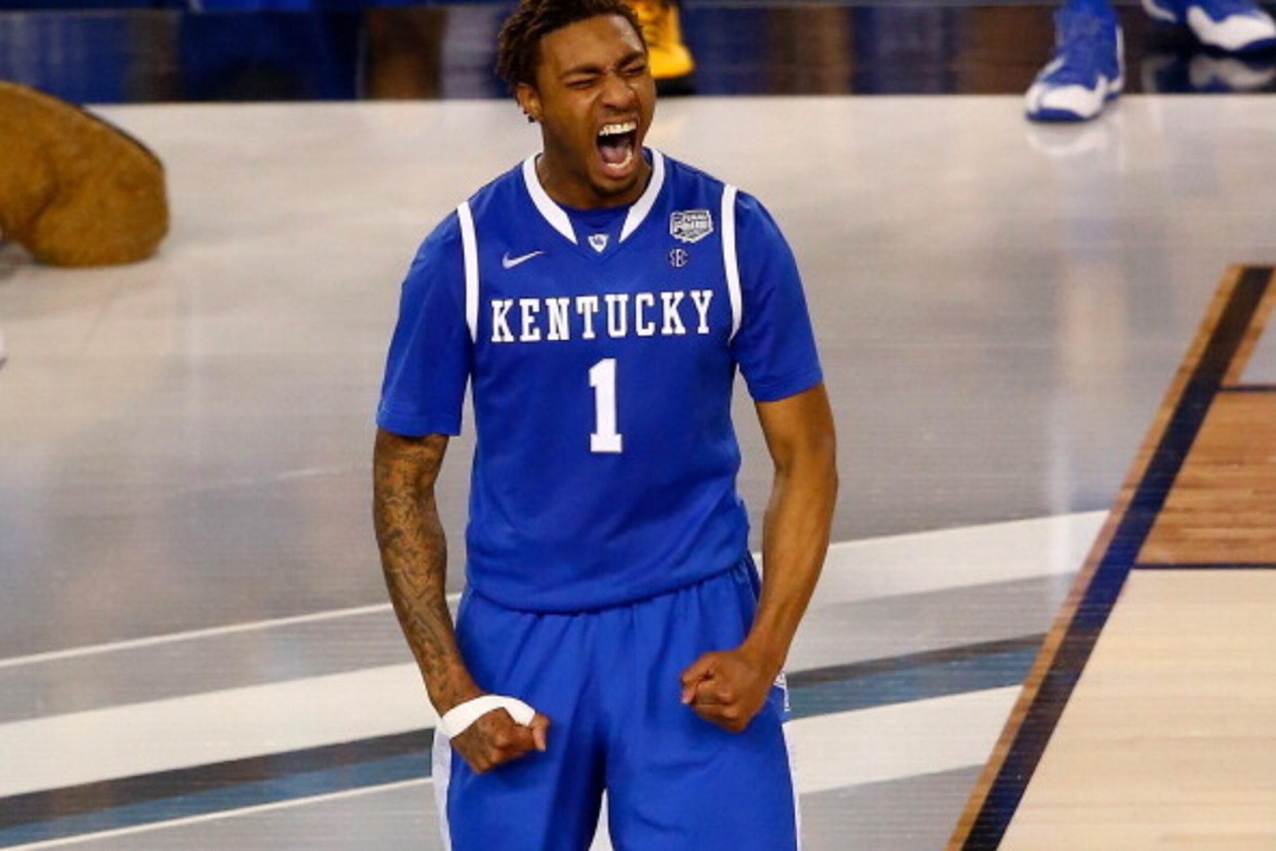 ARLINGTON, TX - APRIL 07:  James Young #1 of the Kentucky Wildcats reacts against the Connecticut Huskies during the NCAA Men's Final Four Championship at AT&T Stadium on April 7, 2014 in Arlington, Texas.  (Photo by Tom Pennington/Getty Images)