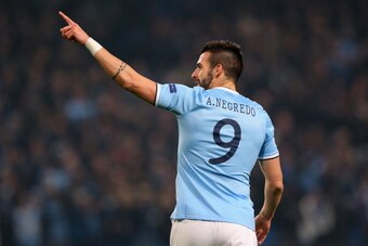 MANCHESTER, ENGLAND - NOVEMBER 05:  Alvaro Negredo of Manchester City celebrates scoring the fourth goal during the UEFA Champions League Group D match between Manchester City and CSKA Moscow at the  Etihad Stadium on November 5, 2013 in Manchester, Engla
