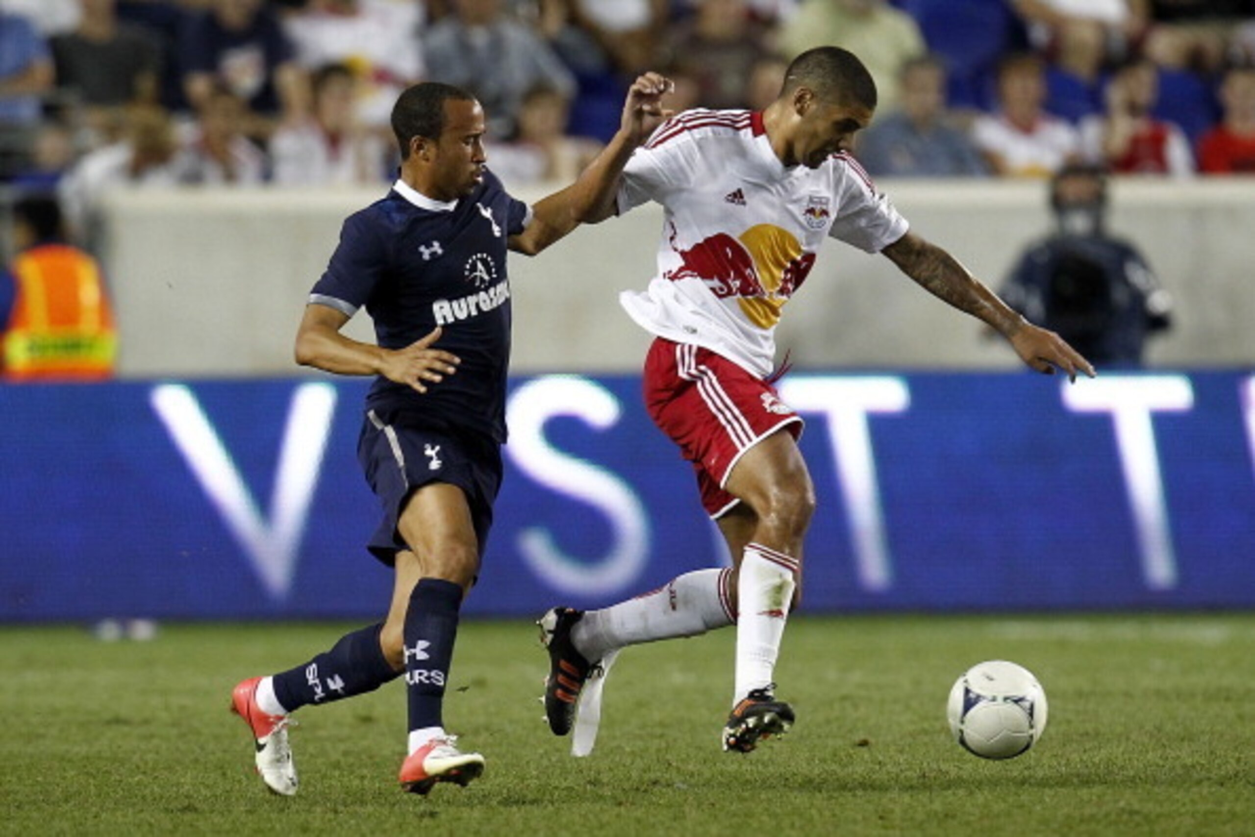 HARRISON, NJ - JULY 31: Victor Palsson #44 of New York Red Bulls and Aaron Lennon #7 of Tottenham Hotspur chase the ball during their match at Red Bull Arena on July 31, 2012 in Harrison, New Jersey. (Photo by Jeff Zelevansky/Getty Images) HARRISON, NJ - JULY 31: Victor Palsson #44 of New York Red Bulls and Aaron Lennon #7 of Tottenham Hotspur chase the ball during their match at Red Bull Arena on July 31, 2012 in Harrison, New Jersey. (Photo by Jeff Zelevansky/Getty Images)