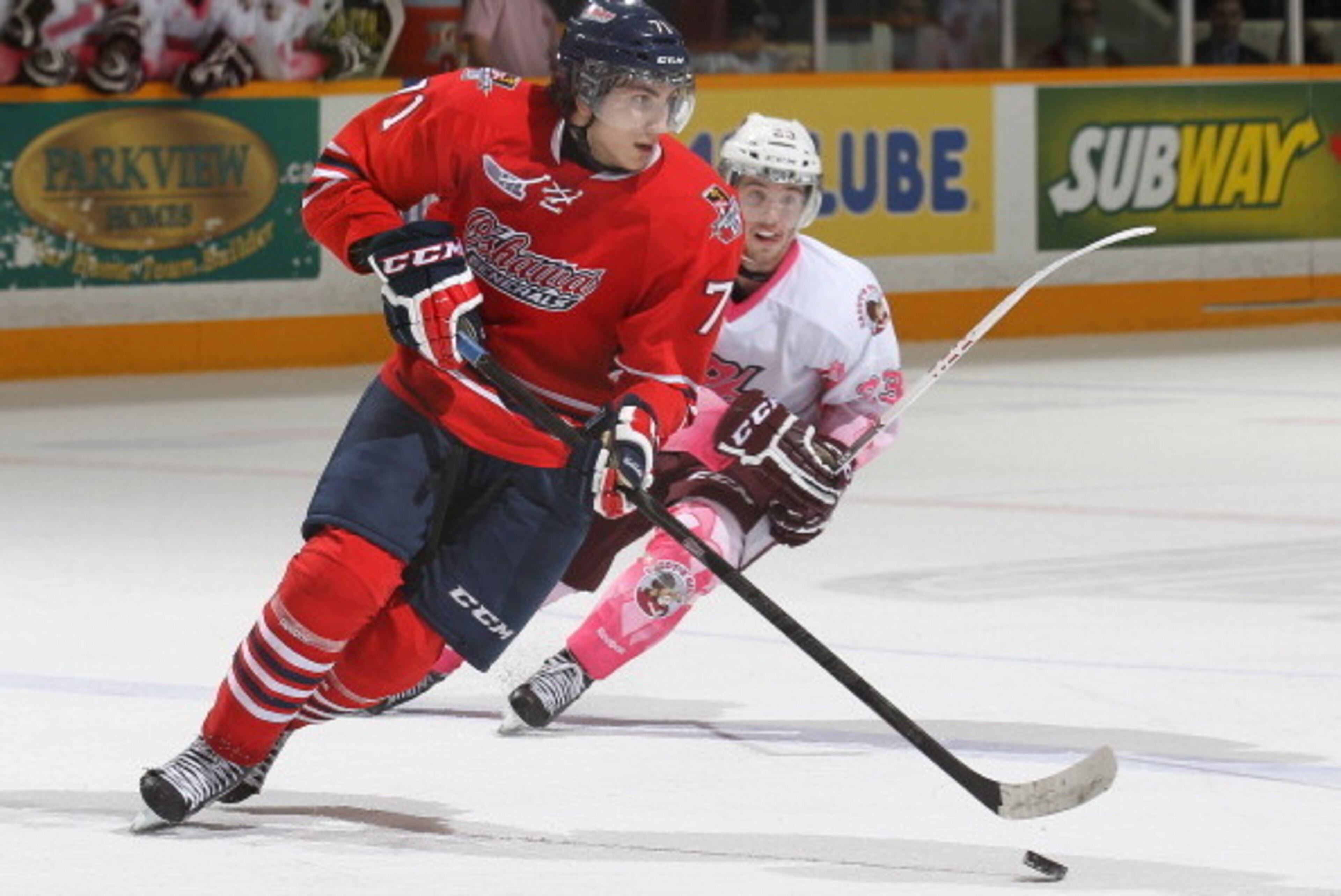 PETERBOROUGH, ON - FEBRUARY 6:  Michael Dal Colle #71 of the Oshawa Generals skates with the puck against the Peterborough Petes during an OHL game at the Peterborough Memorial Centre on February 6, 2014 in Peterborough, Ontario, Canada. The Petes defeate