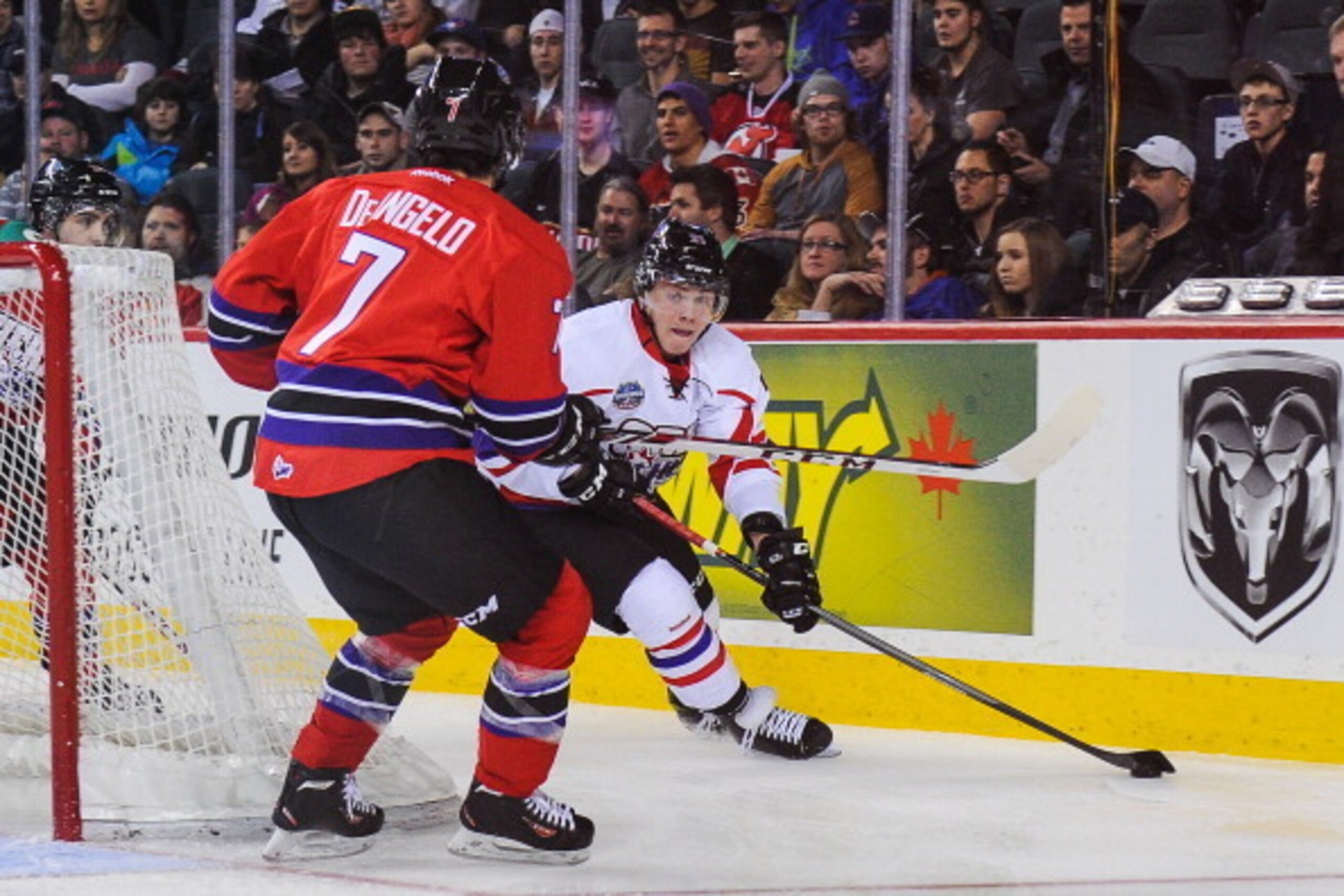 CALGARY, AB - JANUARY 15: Brendan Lemieux #21 of Team Orr skates with the puck against Anthony DeAngelo #7 of Team Cherry during the CHL Top Prospects game at Scotiabank Saddledome on January 15, 2014 in Calgary, Alberta, Canada. (Photo by Derek Leung/Get CALGARY, AB - JANUARY 15: Brendan Lemieux #21 of Team Orr skates with the puck against Anthony DeAngelo #7 of Team Cherry during the CHL Top Prospects game at Scotiabank Saddledome on January 15, 2014 in Calgary, Alberta, Canada. (Photo by Derek Leung/Get