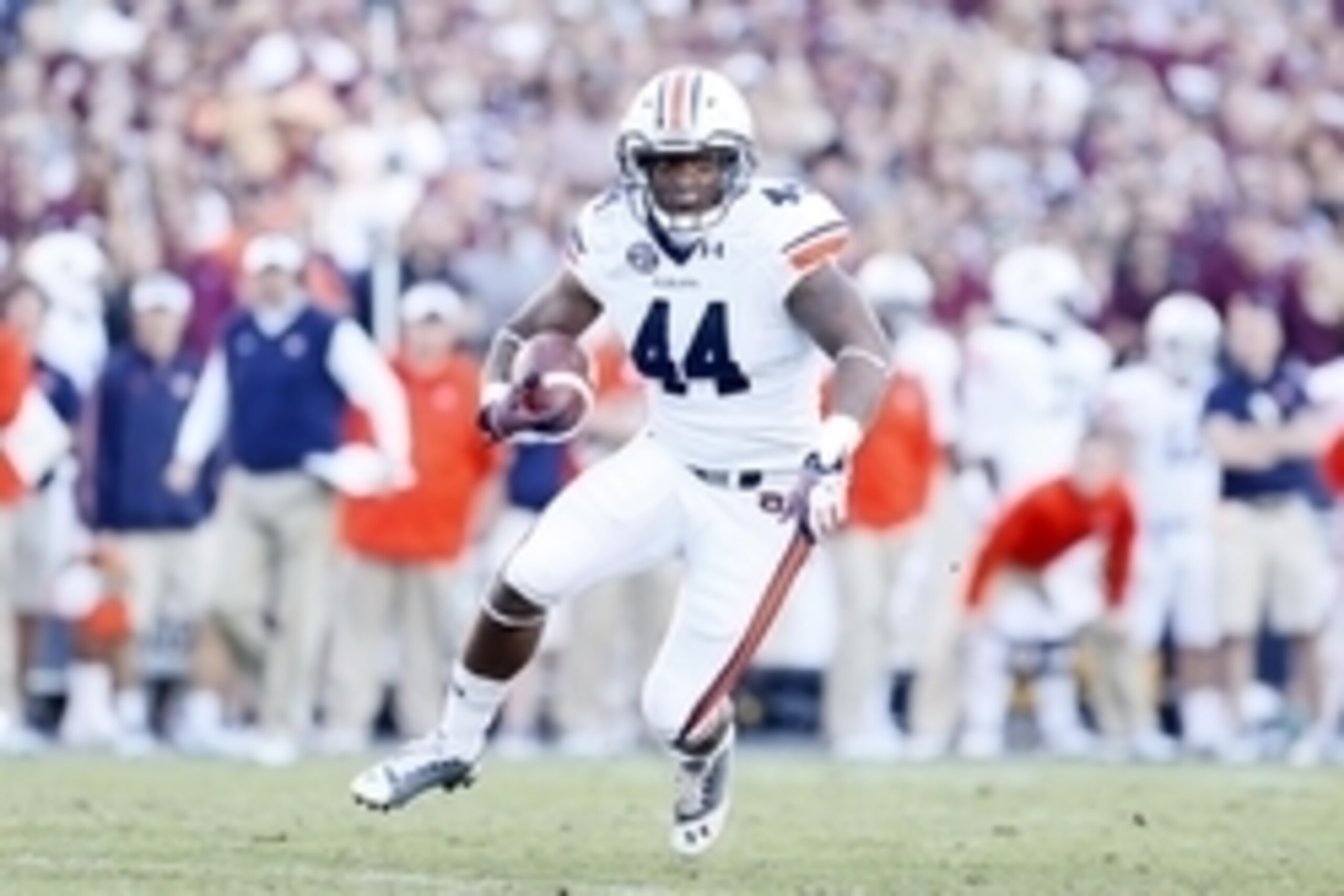 Oct 19, 2013; College Station, TX, USA; Auburn Tigers running back Cameron Artis-Payne (44) runs with the ball against the Texas A&M Aggies during the second half at Kyle Field. Mandatory Credit: Soobum Im-USA TODAY Sports