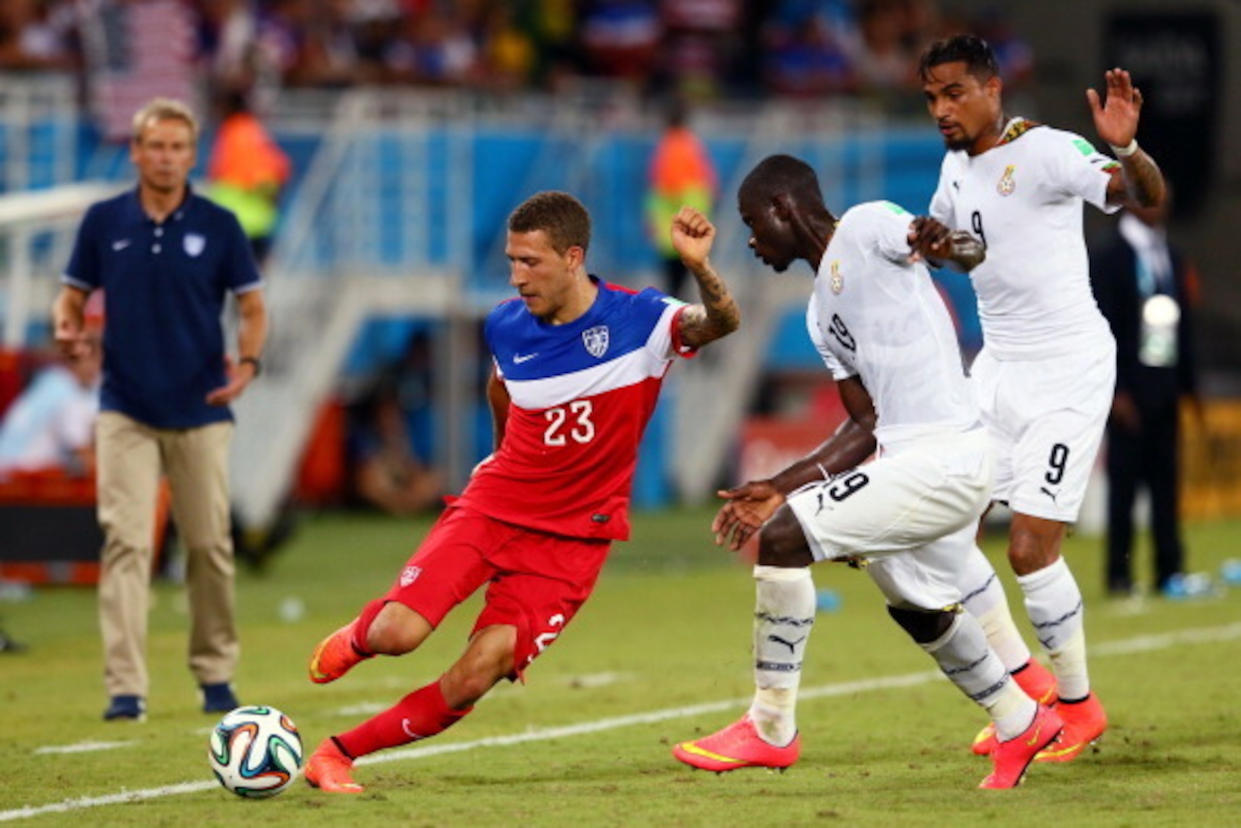 NATAL, BRAZIL - JUNE 16:  Fabian Johnson of the United States controls the ball against Jonathan Mensah of Ghana during the 2014 FIFA World Cup Brazil Group G match between Ghana and the United States at Estadio das Dunas on June 16, 2014 in Natal, Brazil