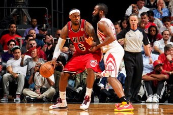 MIAMI, FL - FEBRUARY 6: LeBron James #6 of the Miami Heat posts-up against James Harden #13 of the Houston Rockets on February 6, 2013 at American Airlines Arena in Miami, Florida. NOTE TO USER: User expressly acknowledges and agrees that, by downloading 