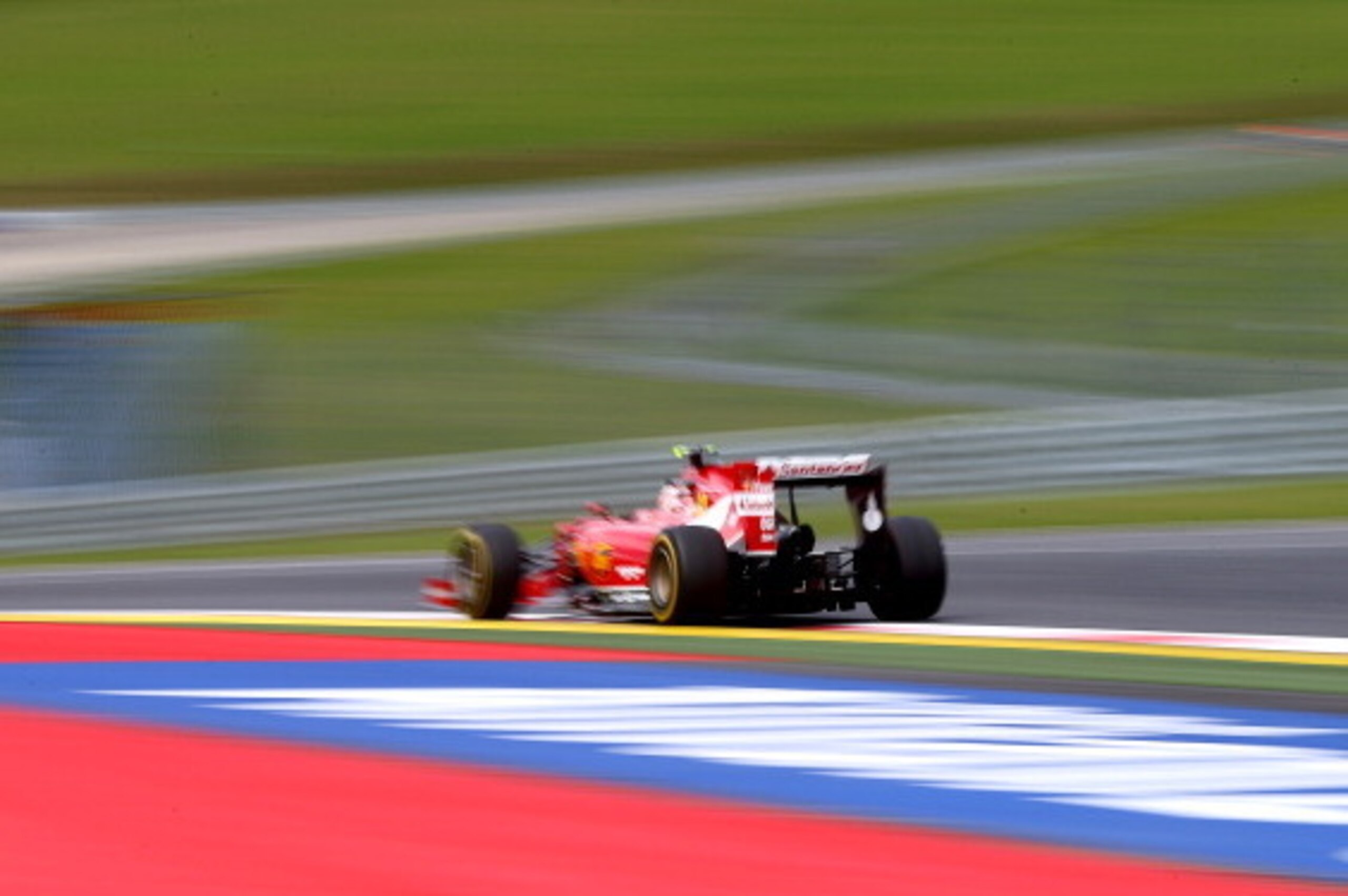 SPIELBERG, AUSTRIA - JUNE 20:  Kimi Raikkonen of Finland and Ferrari drives during practice ahead of the Austrian Formula One Grand Prix at Red Bull Ring on June 20, 2014 in Spielberg, Austria.  (Photo by Mark Thompson/Getty Images)