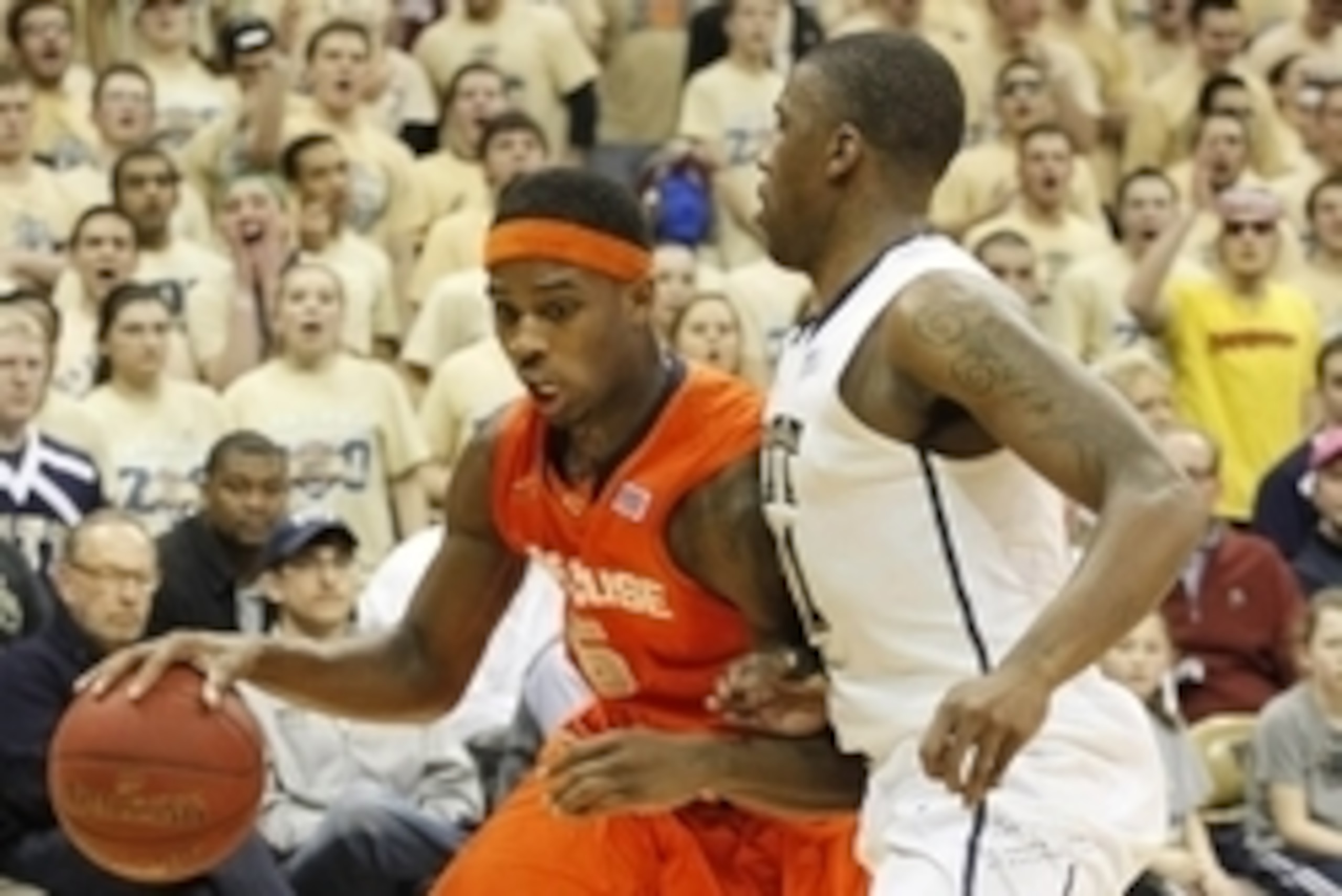 Feb 12, 2014; Pittsburgh, PA, USA; Syracuse Orange forward C.J. Fair (5) moves to the basket as Pittsburgh Panthers forward Lamar Patterson (right) defends during the second half at the Petersen Events Center. Syracuse won 58-56. Mandatory Credit: Charles