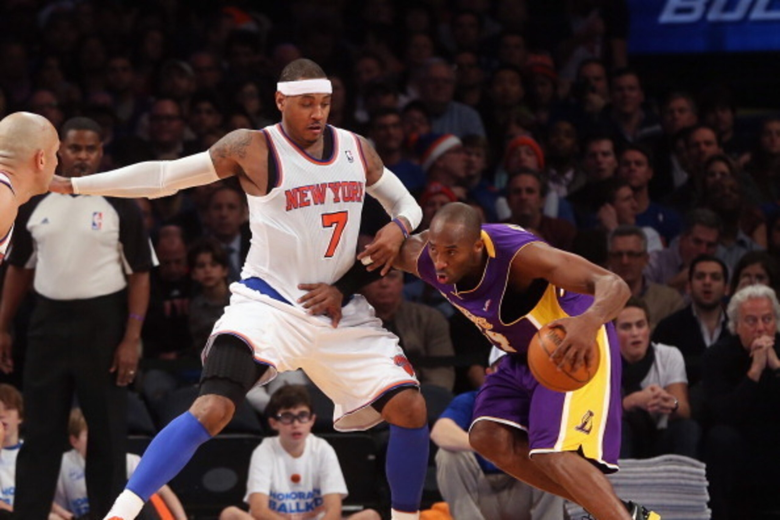 NEW YORK, NY - DECEMBER 13:  Kobe Bryant #24 of the Los Angeles Lakers plays against Carmelo Anthony #7 of the New York Knicks  at Madison Square Garden on December 13, 2012 in New York City. NOTE TO USER: User expressly acknowledges and agrees that, by d