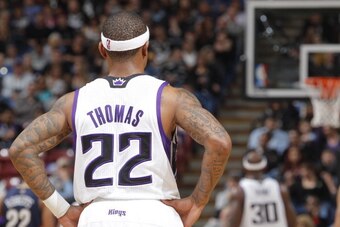 SACRAMENTO, CA - MARCH 3: Isaiah Thomas #22 of the Sacramento Kings in a game against the New Orleans Pelicans on March 3, 2014 at Sleep Train Arena in Sacramento, California. NOTE TO USER: User expressly acknowledges and agrees that, by downloading and o