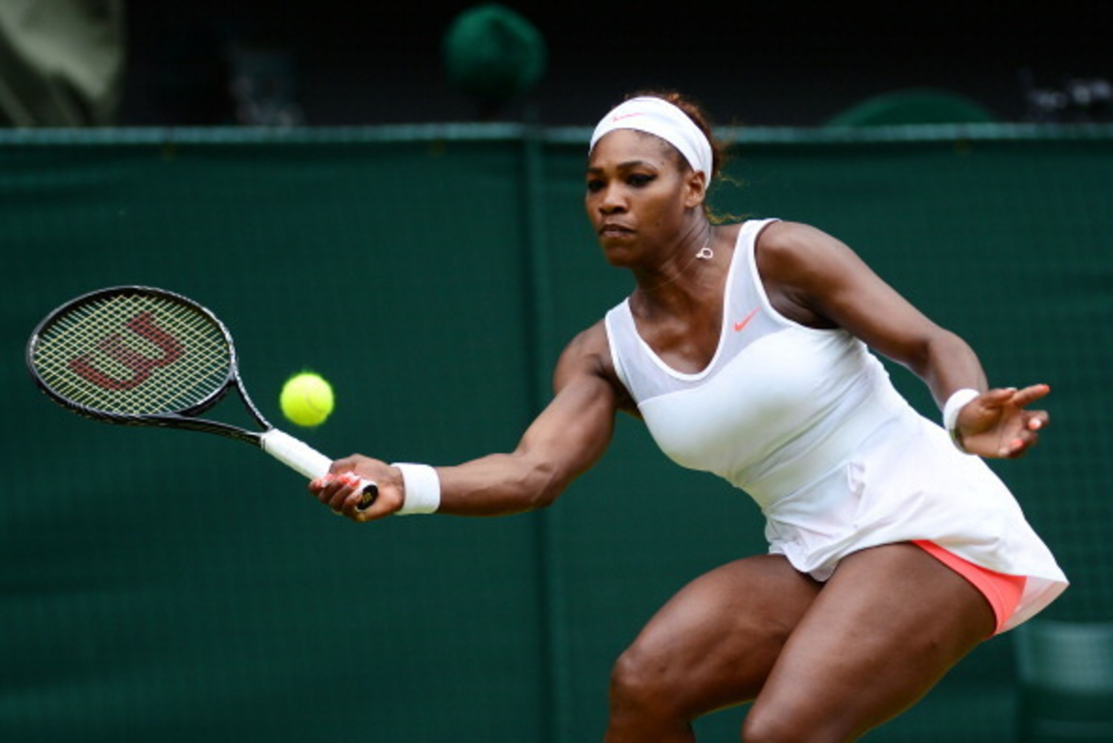 LONDON, ENGLAND - JULY 01: Serena Williams of United States of America plays a forehand during her Ladies' Singles fourth round match against Sabine Lisicki of Germany on day seven of the Wimbledon Lawn Tennis Championships at the All England Lawn Tennis LONDON, ENGLAND - JULY 01: Serena Williams of United States of America plays a forehand during her Ladies' Singles fourth round match against Sabine Lisicki of Germany on day seven of the Wimbledon Lawn Tennis Championships at the All England Lawn Tennis
