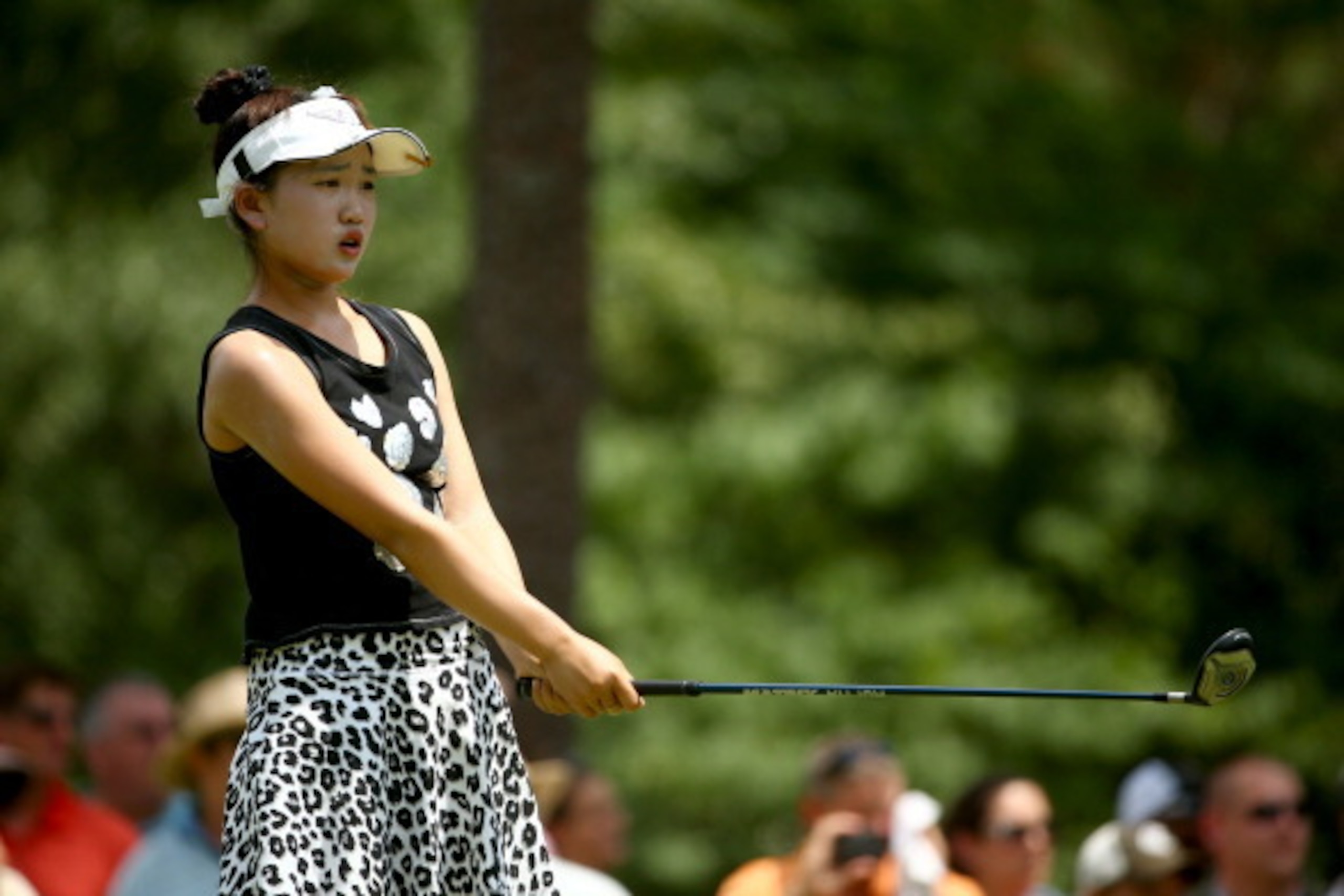 PINEHURST, NC - JUNE 20:  Eleven-year old Amateur Lucy Li of the United States hits a tee shot on the sixth hole during the second round of the 69th U.S. Women's Open at Pinehurst Resort & Country Club, Course No. 2 on June 20, 2014 in Pinehurst, North Ca
