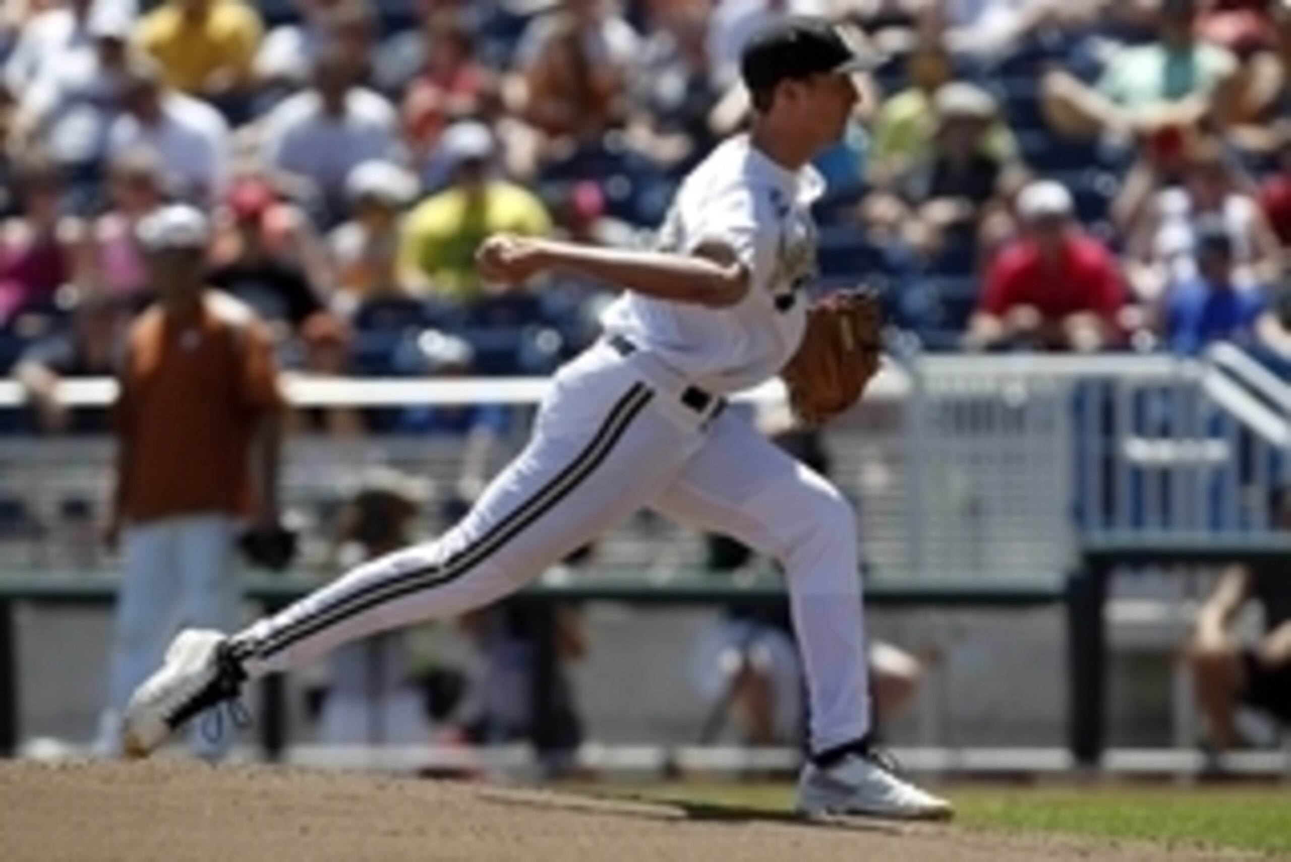 Jun 20, 2014; Omaha, NE, USA; Vanderbilt Commodores pitcher Brian Miller (33) throws against the Texas Longhorns Vanderbilt Commodores during game eleven of the 2014 College World Series at TD Ameritrade Park Omaha. Mandatory Credit: Bruce Thorson-USA TOD Jun 20, 2014; Omaha, NE, USA; Vanderbilt Commodores pitcher Brian Miller (33) throws against the Texas Longhorns Vanderbilt Commodores during game eleven of the 2014 College World Series at TD Ameritrade Park Omaha. Mandatory Credit: Bruce Thorson-USA TOD