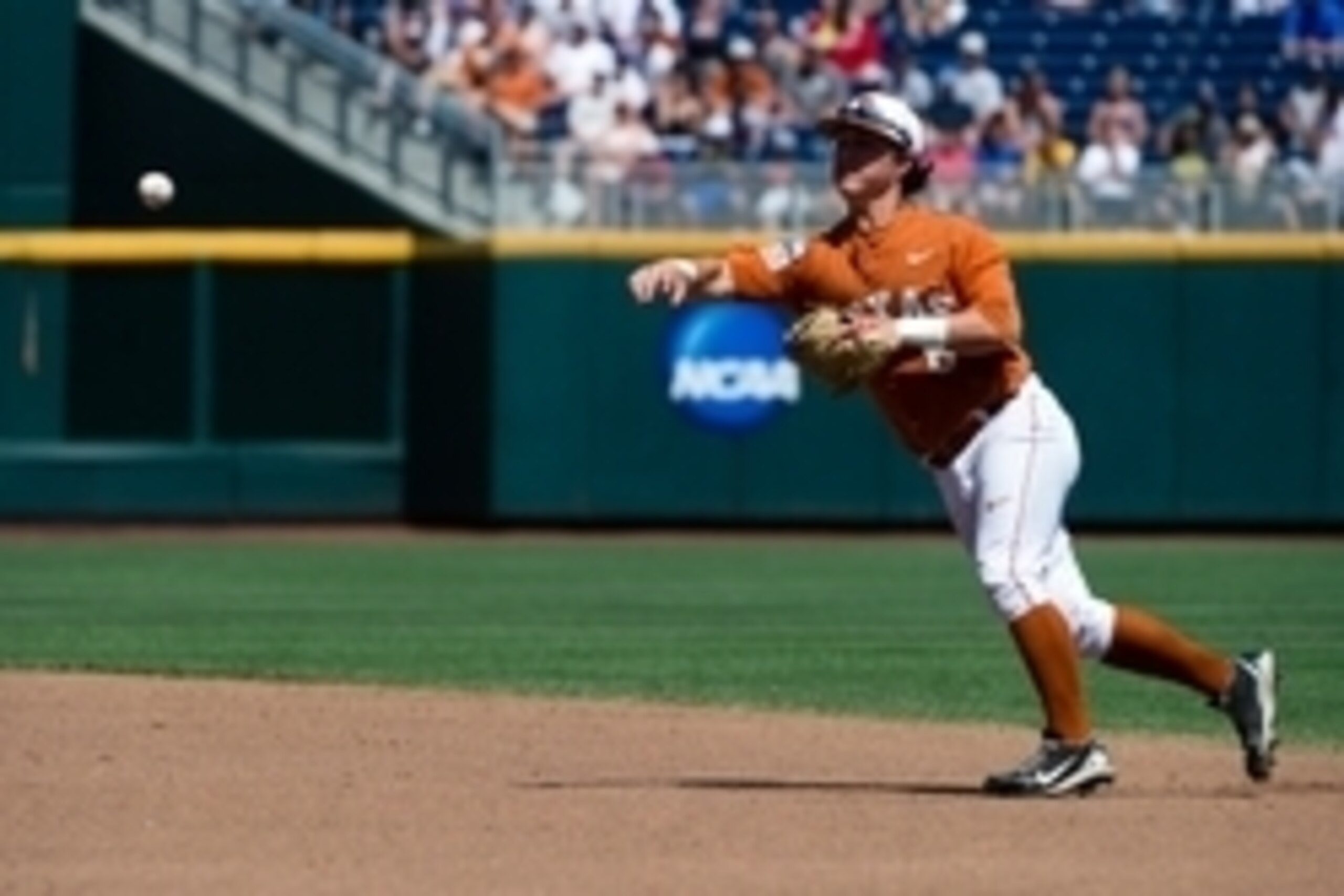 Jun 20, 2014; Omaha, NE, USA; Texas Longhorns infielder Brooks Marlow (8) throws to first base against the Vanderbilt Commodores during game eleven of the 2014 College World Series at TD Ameritrade Park Omaha. Texas defeated Vanderbilt 4-0. Mandatory Cred Jun 20, 2014; Omaha, NE, USA; Texas Longhorns infielder Brooks Marlow (8) throws to first base against the Vanderbilt Commodores during game eleven of the 2014 College World Series at TD Ameritrade Park Omaha. Texas defeated Vanderbilt 4-0. Mandatory Cred