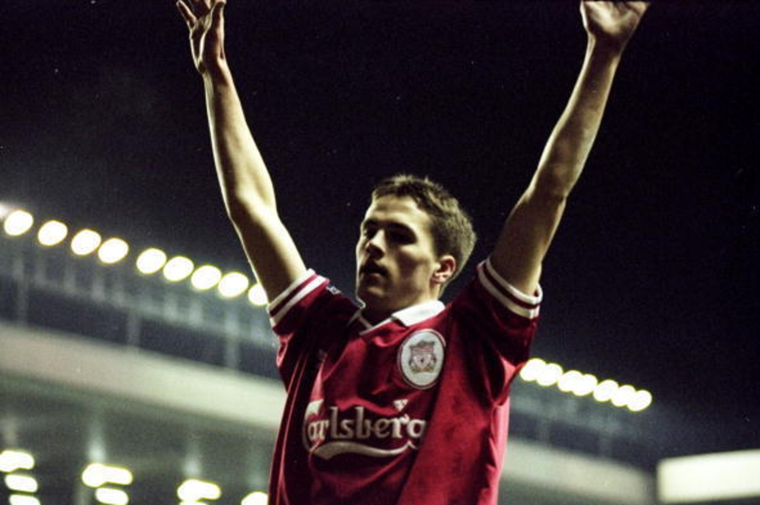 6 May 1998:  Michael Owen of Liverpool celebrates his goal during the FA Carling Premiership match against Arsenal played at Anfield in Liverpool, England.  The match finished in a 4-0 win for Liverpool. \ Mandatory Credit: Ross Kinnaird /Allsport