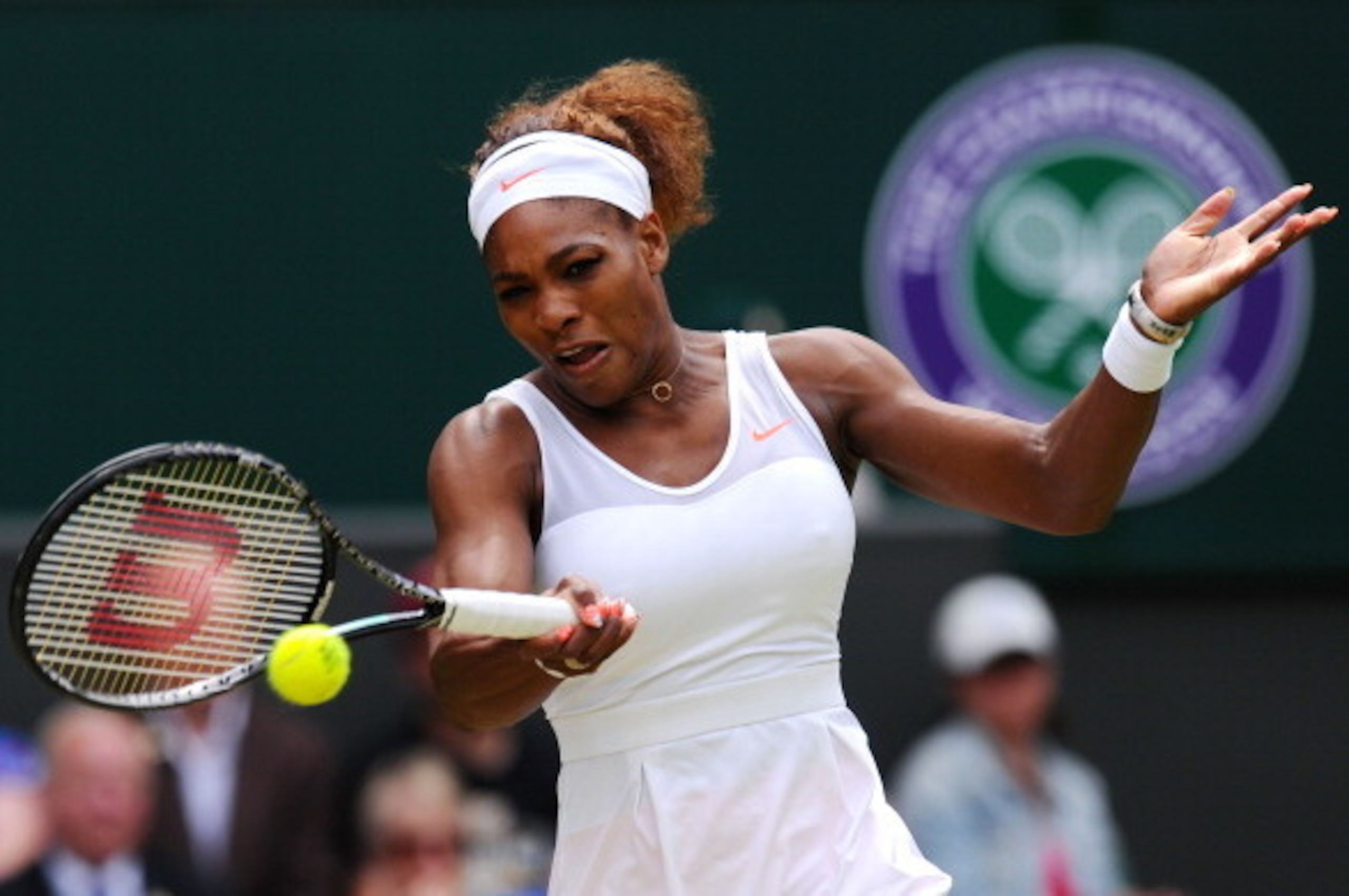 LONDON, ENGLAND - JULY 01:  Serena Williams of United States of America plays a forehand during her Ladies' Singles fourth round match against Sabine Lisicki of Germany on day seven of the Wimbledon Lawn Tennis Championships at the All England Lawn Tennis