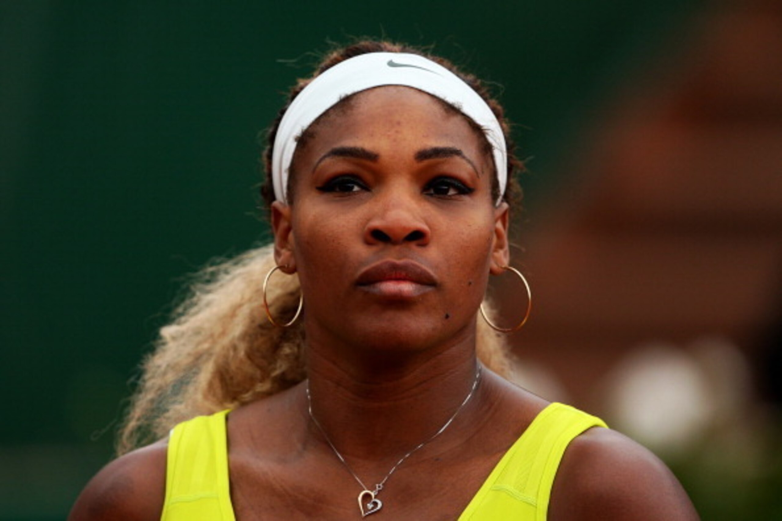 PARIS, FRANCE - MAY 28:  Serena Williams of the United States looks on during her women's singles match against Garbine Muguruza of Spain on day four of the French Open at Roland Garros on May 28, 2014 in Paris, France.  (Photo by Clive Brunskill/Getty Im
