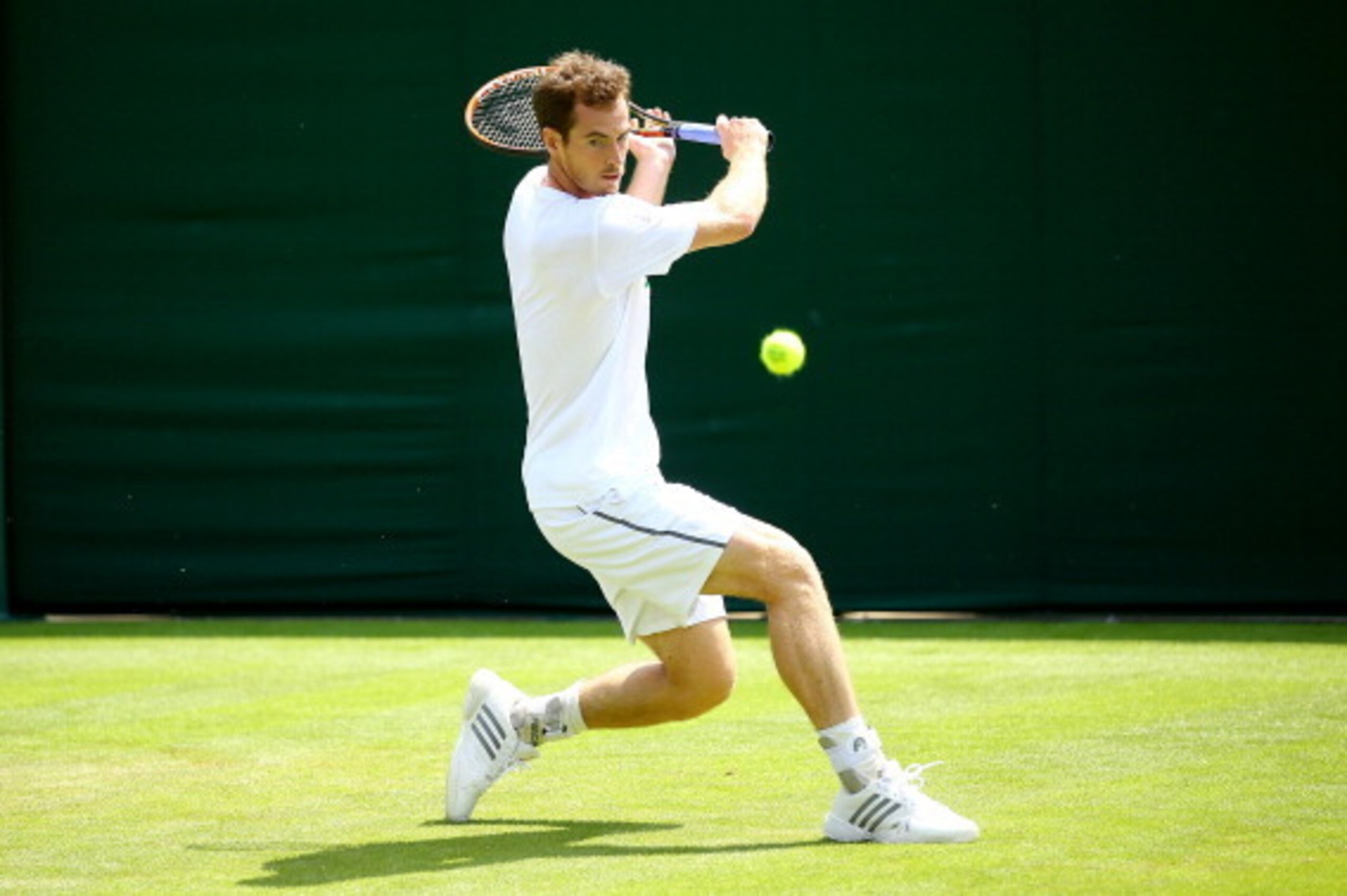 LONDON, ENGLAND - JUNE 21:  Andy Murray of Great Britain in action in a practice session during previews for Wimbledon Championships at Wimbledon on June 21, 2014 in London, England.  (Photo by Al Bello/Getty Images)