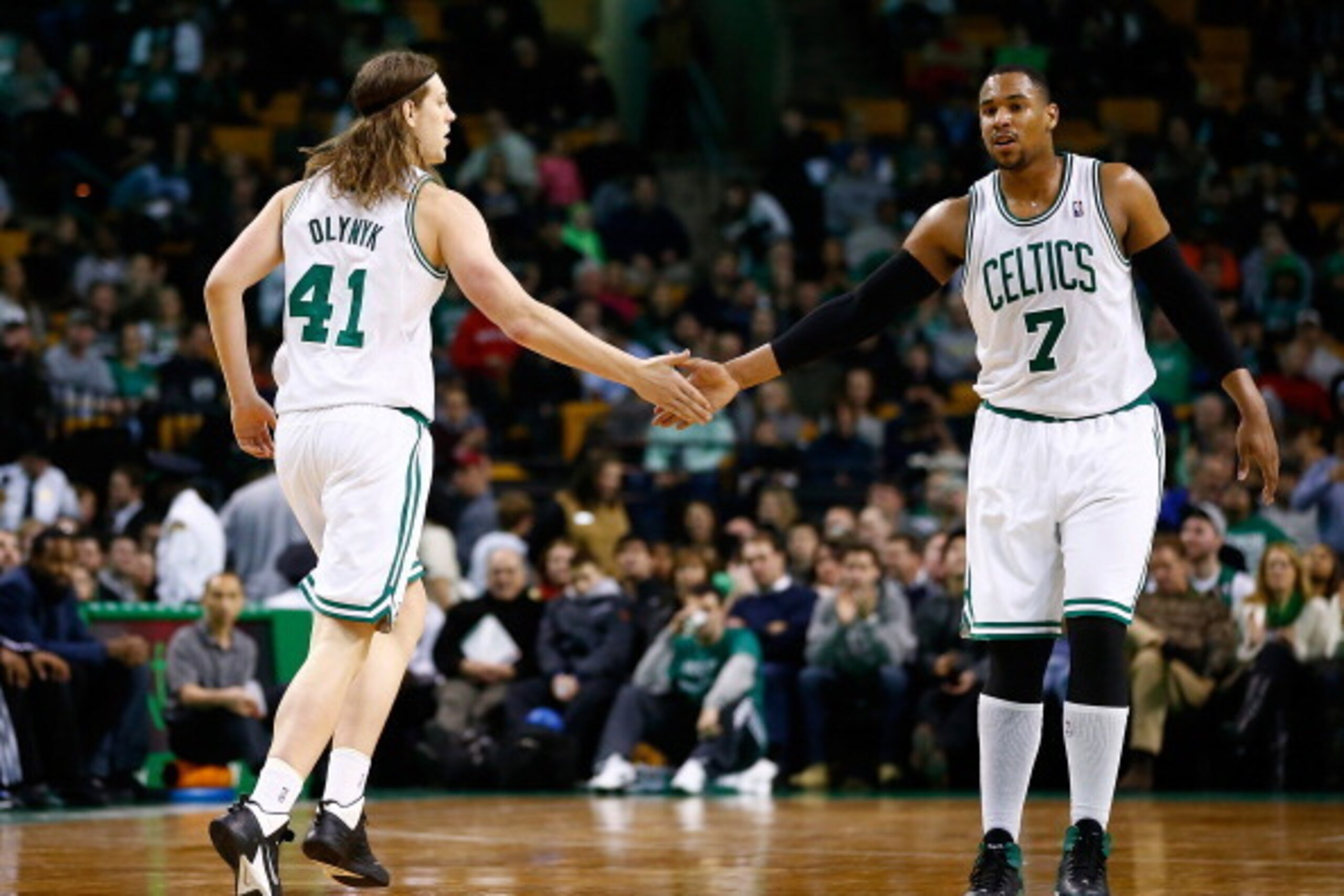 BOSTON, MA - DECEMBER 16: Kelly Olynyk #41 and Jared Sullinger #7 of the Boston Celtics react following a basket in the second quarter against the Minnesota Timberwolves during the game at TD Garden on December 16, 2013 in Boston, Massachusetts. NOTE TO U