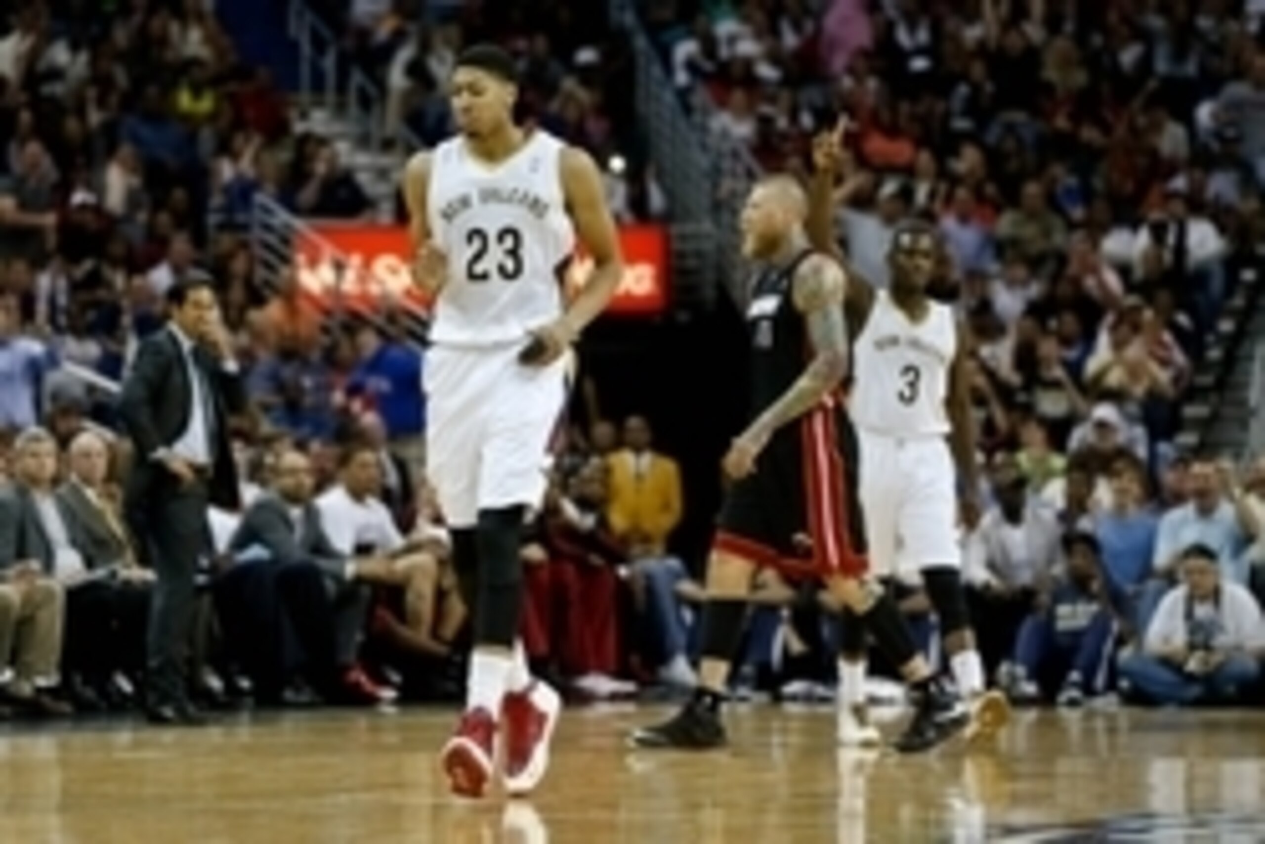 Mar 22, 2014; New Orleans, LA, USA; New Orleans Pelicans forward Anthony Davis (23) reacts after scoring against the Miami Heat during the second half of a game at the Smoothie King Center. The Pelicans defeated the Heat 105-95. Mandatory Credit: Derick E