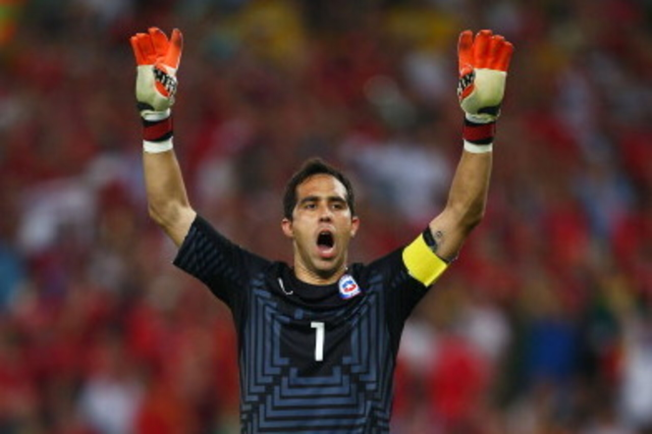RIO DE JANEIRO, BRAZIL - JUNE 18: Claudio Bravo of Chile celebrates after defeating Spain 2-0 during the 2014 FIFA World Cup Brazil Group B match between Spain and Chile at Maracana on June 18, 2014 in Rio de Janeiro, Brazil.  (Photo by Clive Rose/Getty I