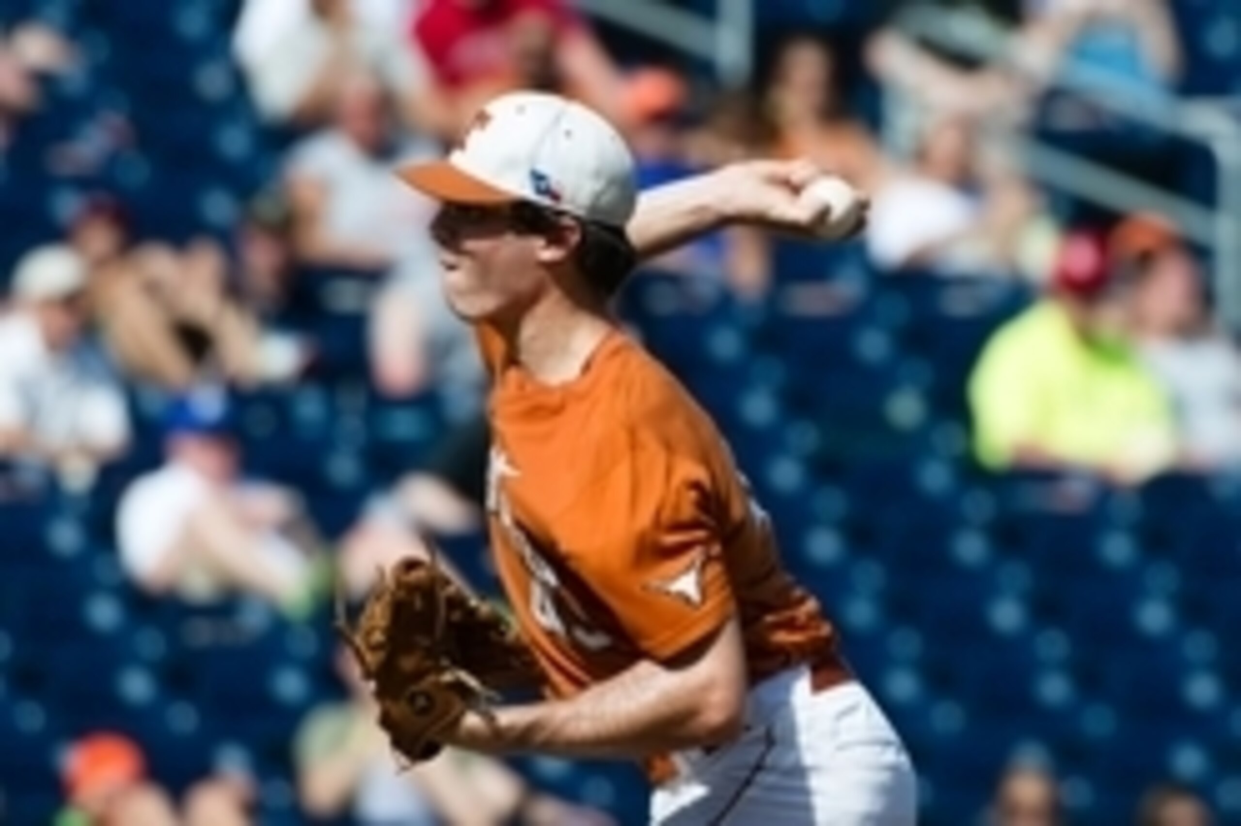 Jun 20, 2014; Omaha, NE, USA; Texas Longhorns pitcher John Curtiss (43) pitches in relief against the Vanderbilt Commodores during game eleven of the 2014 College World Series at TD Ameritrade Park Omaha. Texas defeated Vanderbilt 4-0. Mandatory Credit: S