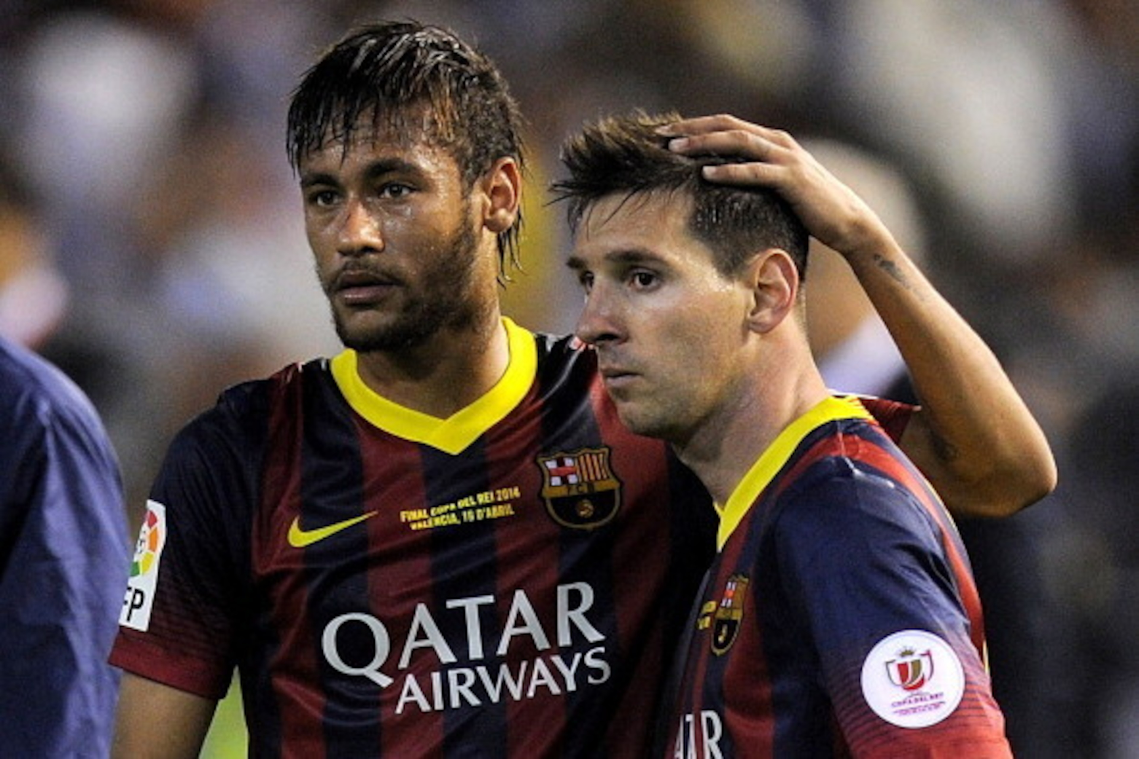 VALENCIA, SPAIN - APRIL 16: Lionel Messi (R) and Neymar of FC Barcelona react after losing 2-1 to Real Madrid in the Copa del Rey Final between Real Madrid and Barcelona at Estadio Mestalla on April 16, 2014 in Valencia, Spain. (Photo by Denis Doyle/Get VALENCIA, SPAIN - APRIL 16: Lionel Messi (R) and Neymar of FC Barcelona react after losing 2-1 to Real Madrid in the Copa del Rey Final between Real Madrid and Barcelona at Estadio Mestalla on April 16, 2014 in Valencia, Spain. (Photo by Denis Doyle/Get