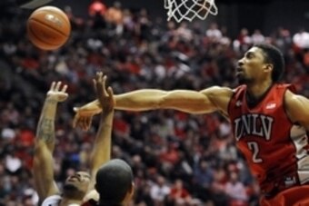 Jan 18, 2014; San Diego, CA, USA; UNLV Runnin' Rebels forward Khem Birch (2) blocks a shot attempt by San Diego State Aztecs guard Aqeel Quinn (10) during the first half at Viejas Arena. Mandatory Credit: Christopher Hanewinckel-USA TODAY Sports Jan 18, 2014; San Diego, CA, USA; UNLV Runnin' Rebels forward Khem Birch (2) blocks a shot attempt by San Diego State Aztecs guard Aqeel Quinn (10) during the first half at Viejas Arena. Mandatory Credit: Christopher Hanewinckel-USA TODAY Sports