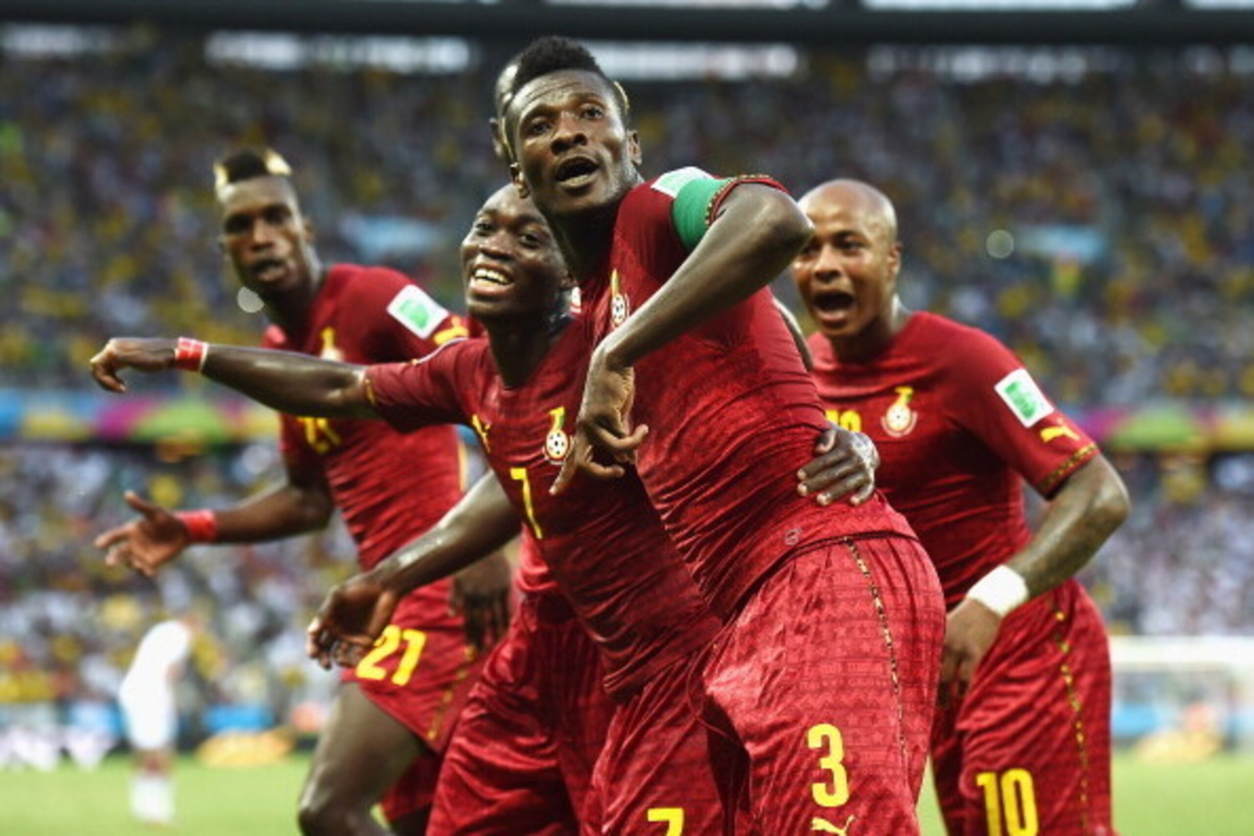 FORTALEZA, BRAZIL - JUNE 21: Asamoah Gyan of Ghana celebrates scoring his team's second goal during the 2014 FIFA World Cup Brazil Group G match between Germany and Ghana at Castelao on June 21, 2014 in Fortaleza, Brazil.  (Photo by Laurence Griffiths/Get