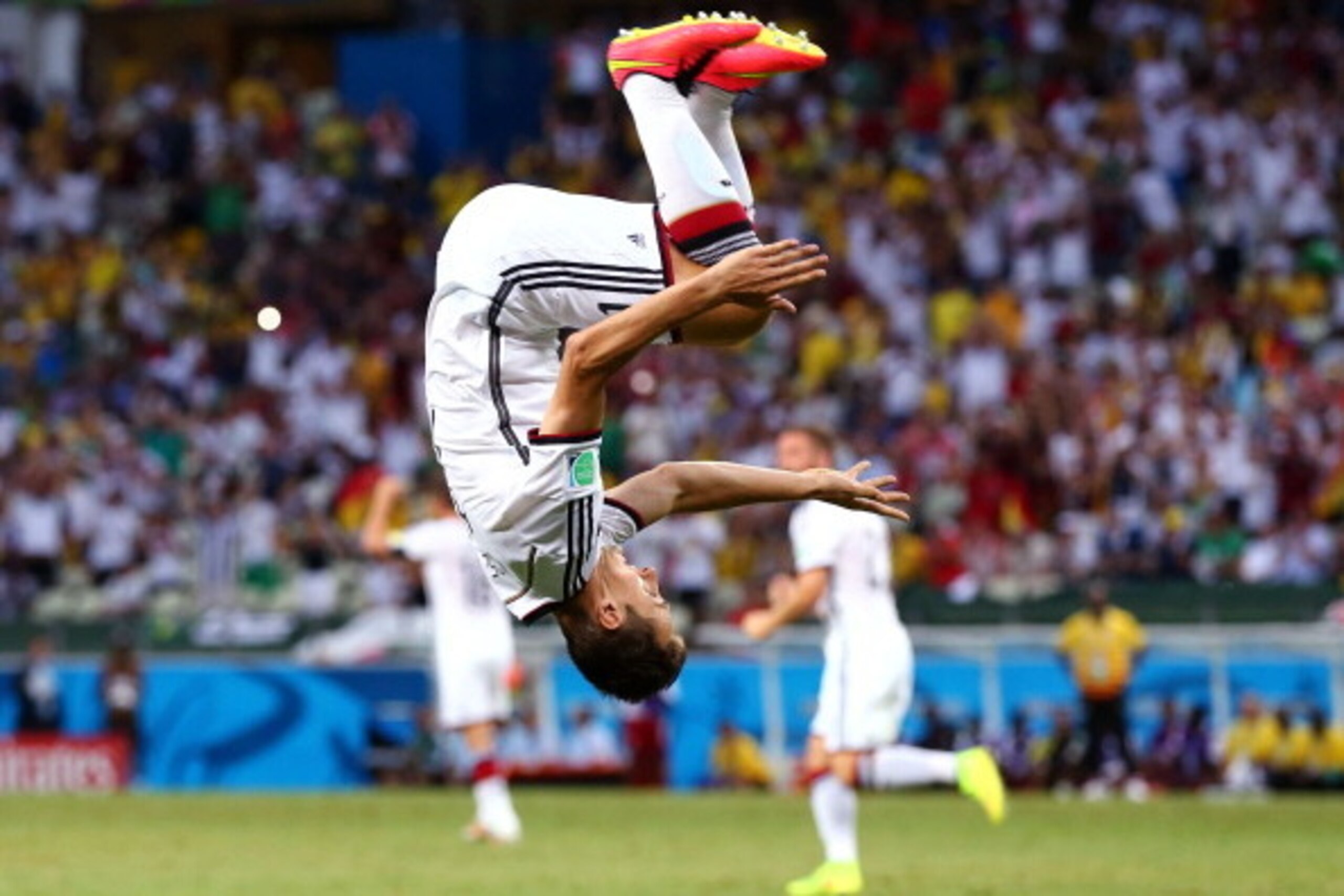 FORTALEZA, BRAZIL - JUNE 21: Miroslav Klose of Germany does a flip in celebration of scoring his team's second goal during the 2014 FIFA World Cup Brazil Group G match between Germany and Ghana at Castelao on June 21, 2014 in Fortaleza, Brazil.  (Photo by