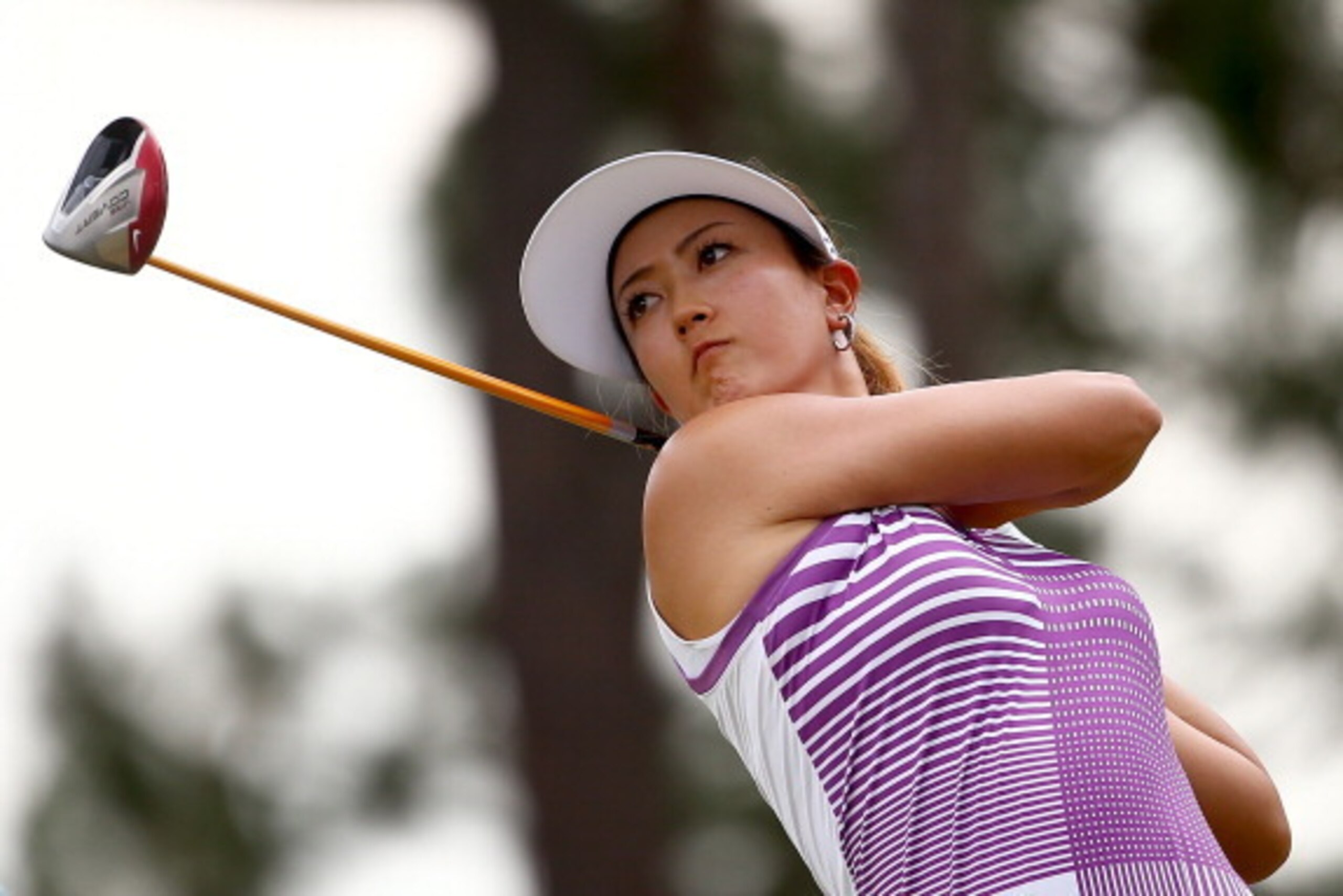 PINEHURST, NC - JUNE 21:  Michelle Wie of the United States hits a tee shot on the 14th hole during the third round of the 69th U.S. Women's Open at Pinehurst Resort & Country Club, Course No. 2 on June 21, 2014 in Pinehurst, North Carolina.  (Photo by St