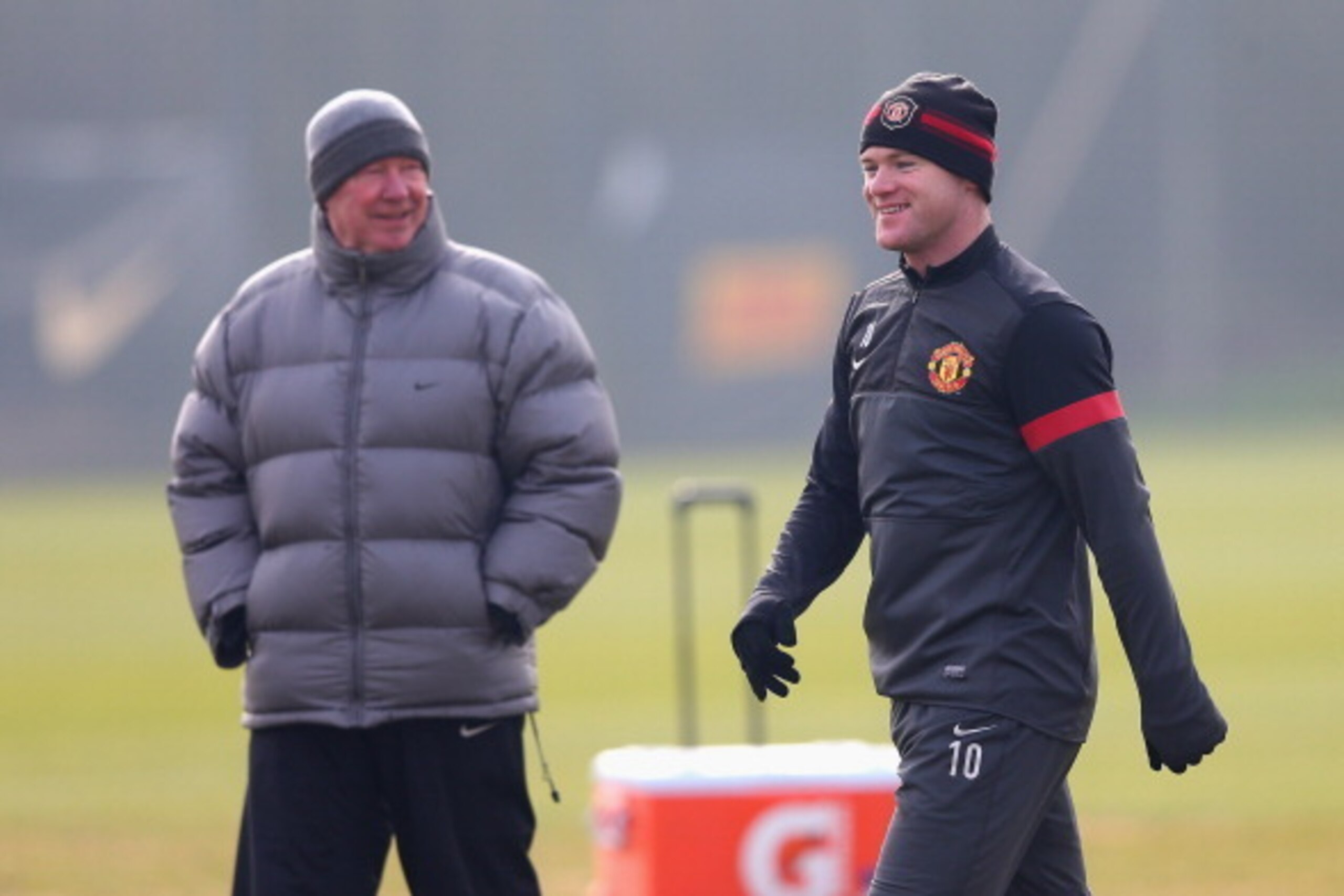 MANCHESTER, ENGLAND - MARCH 04:  Wayne Rooney of Manchester United and Sir Alex Ferguson look on during a training session at Carrington Training Ground on March 4, 2013 in Manchester, England.  (Photo by Alex Livesey/Getty Images)