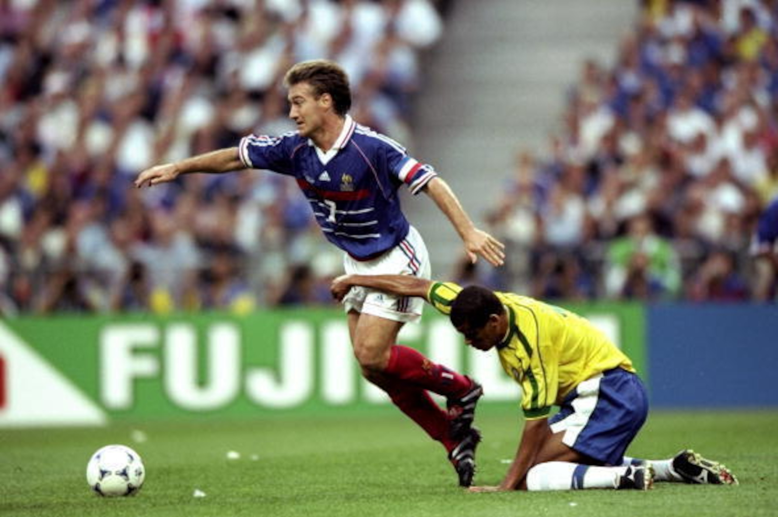 12 Jul 1998:  France captain Didier Deschamps is held as he goes past Rivaldo of Brazil during the World Cup Final at the Stade de France in St Denis. France won 3-0.  \ Mandatory Credit: Shaun Botterill /Allsport