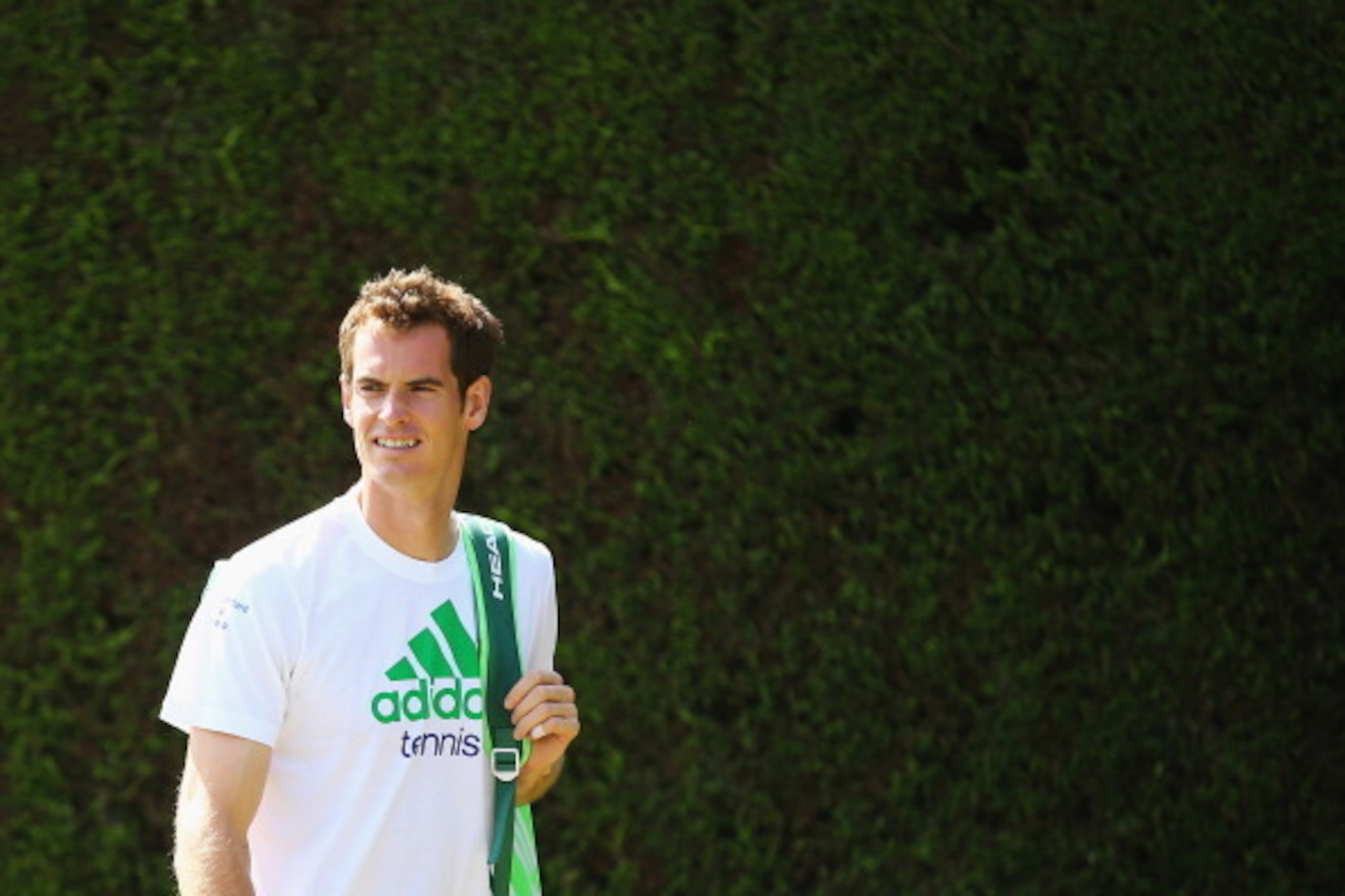 LONDON, ENGLAND - JUNE 22:  Andy Murray of Great Britain walks out to start a practice session during previews ahead of the Wimbledon Championships at Wimbledon on June 22, 2014 in London, England.  (Photo by Al Bello/Getty Images)